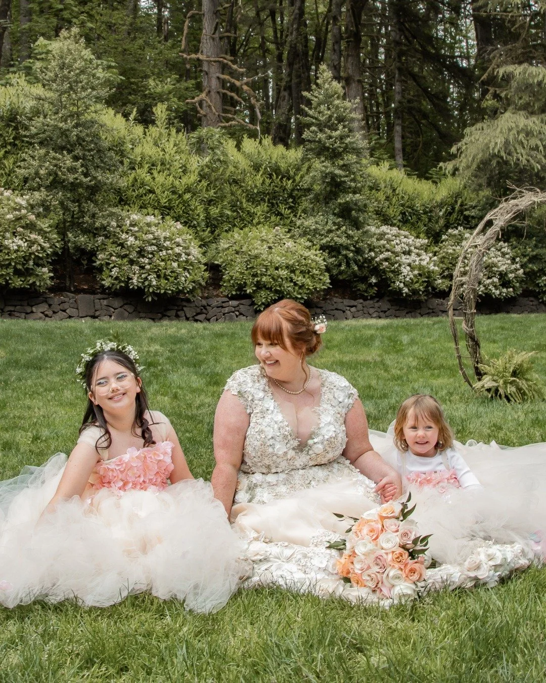 A bride and her flower girls! I love this photo of the girlies. This wedding was so full of whimsy with flower crowns, bubbles, toy swords, and a magical portal arch made with branches from the Grandma of the Bride's house. I was lucky to be part of 