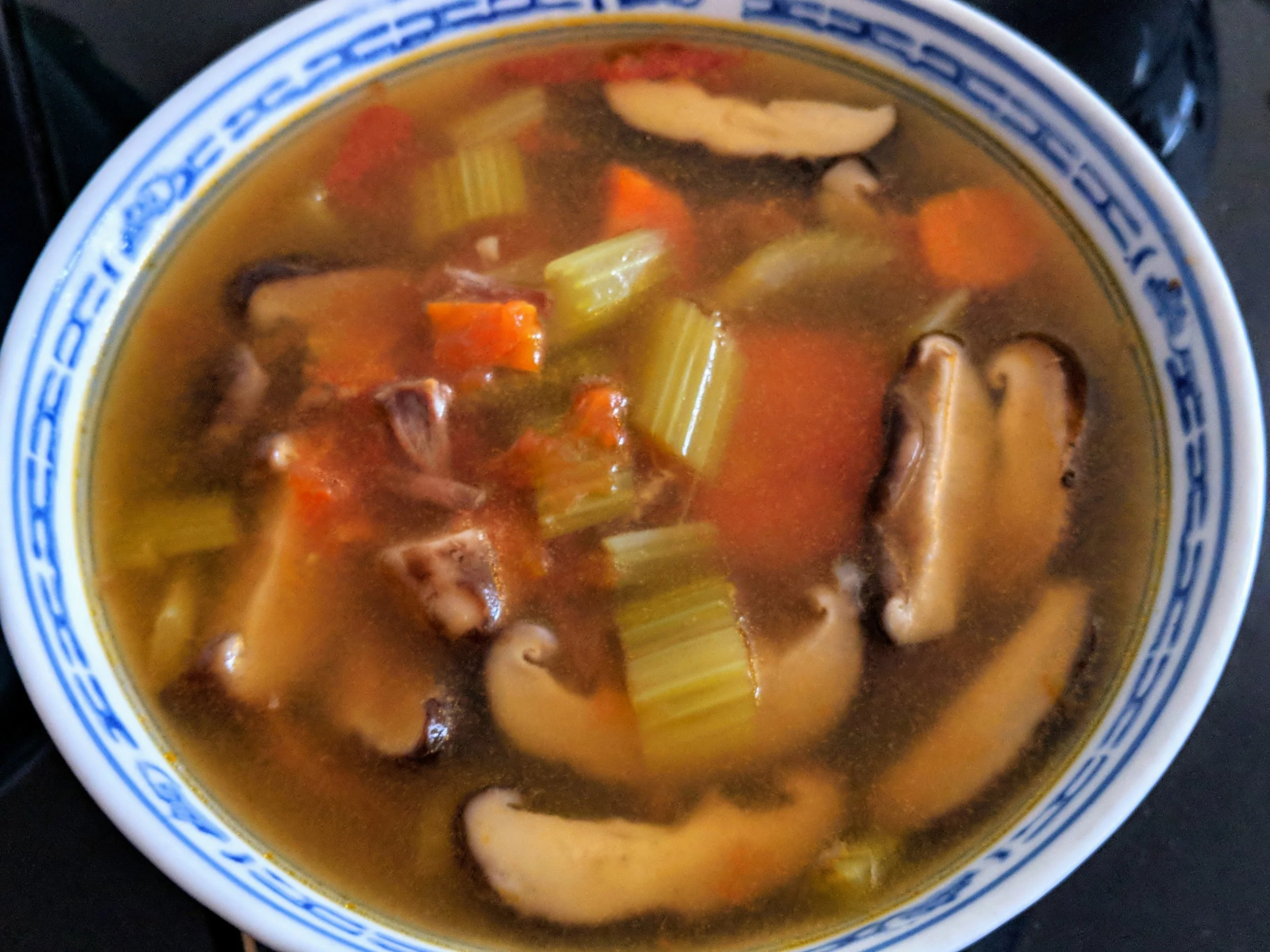 Hearty oxtail soup with shiitake mushrooms