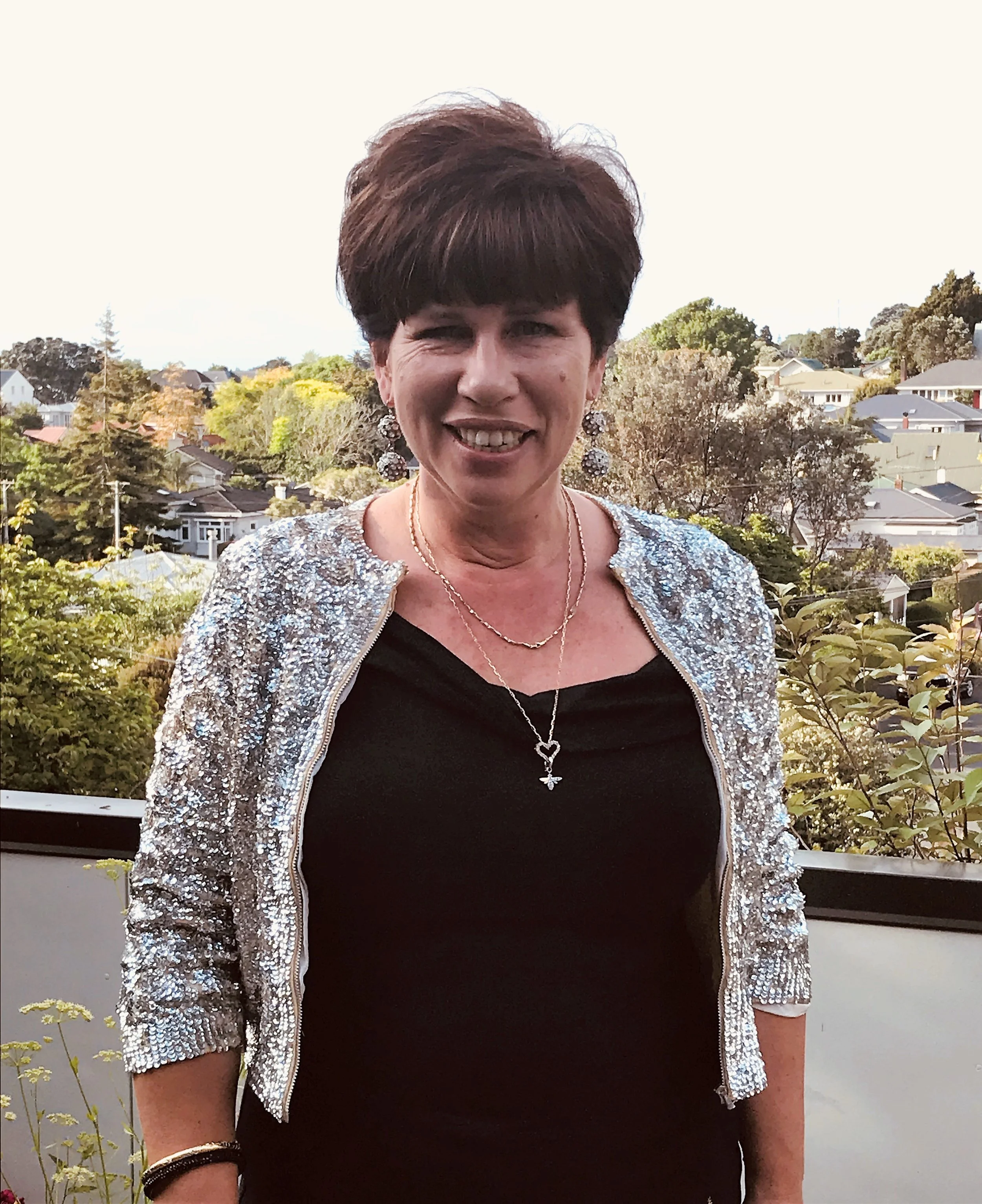 VALERIA BURROWS, DIRECTOR