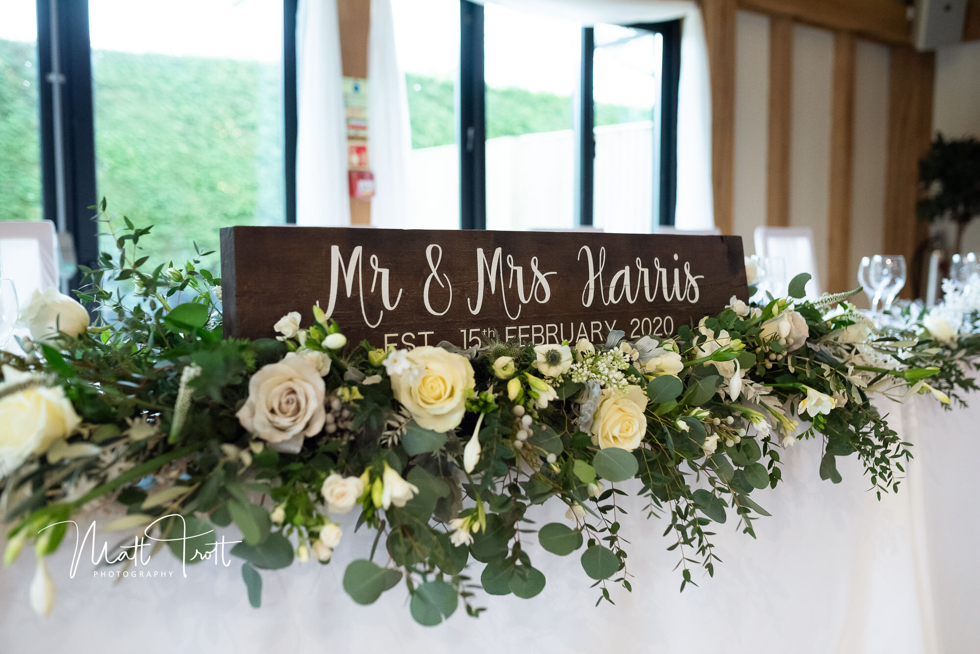 Table top flowers at the old kent barn wedding venue
