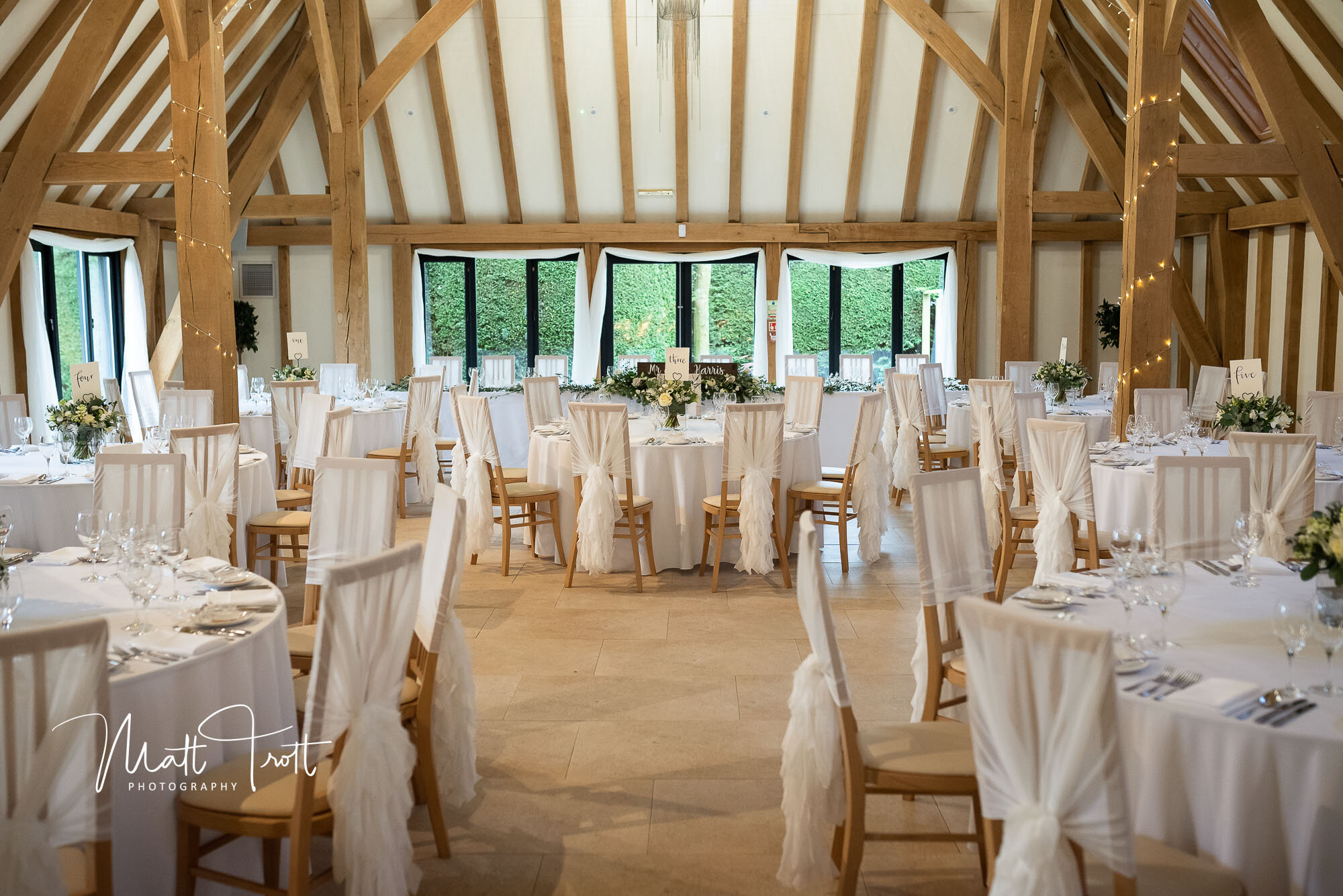 Wedding breakfast room ready for guests at the Old Kent Barn