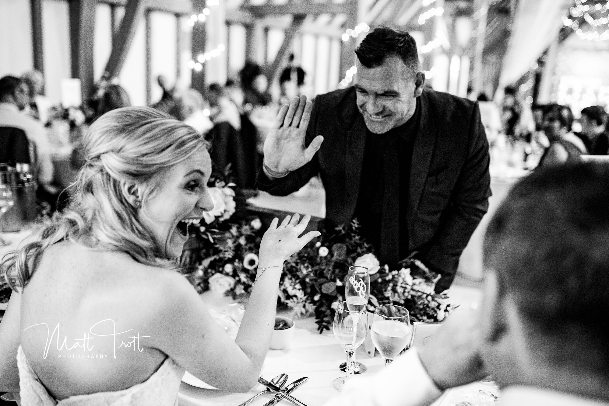 Magician showing a magic trick at the old kent barn