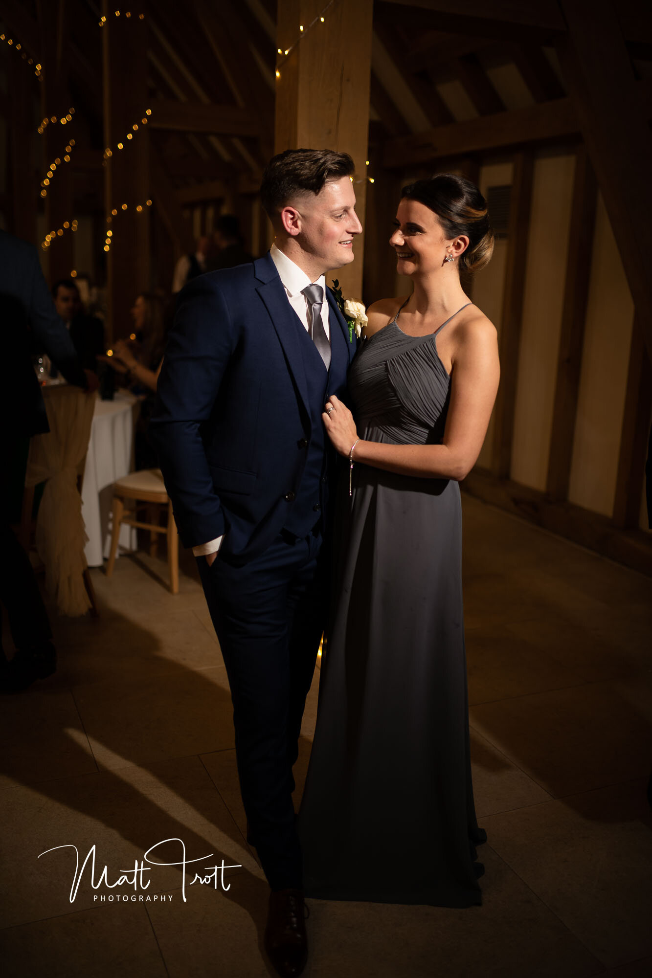 Guests smiling at the old kent barn