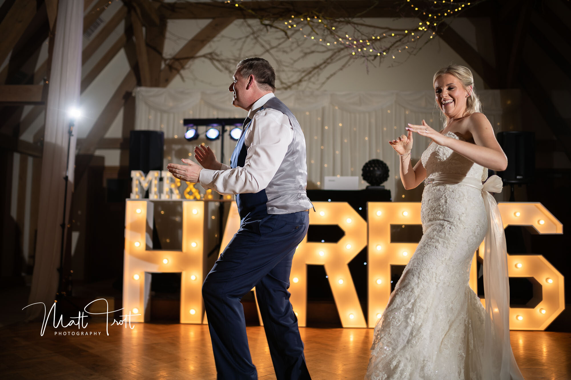 Bride and father dancing at the old kent barn