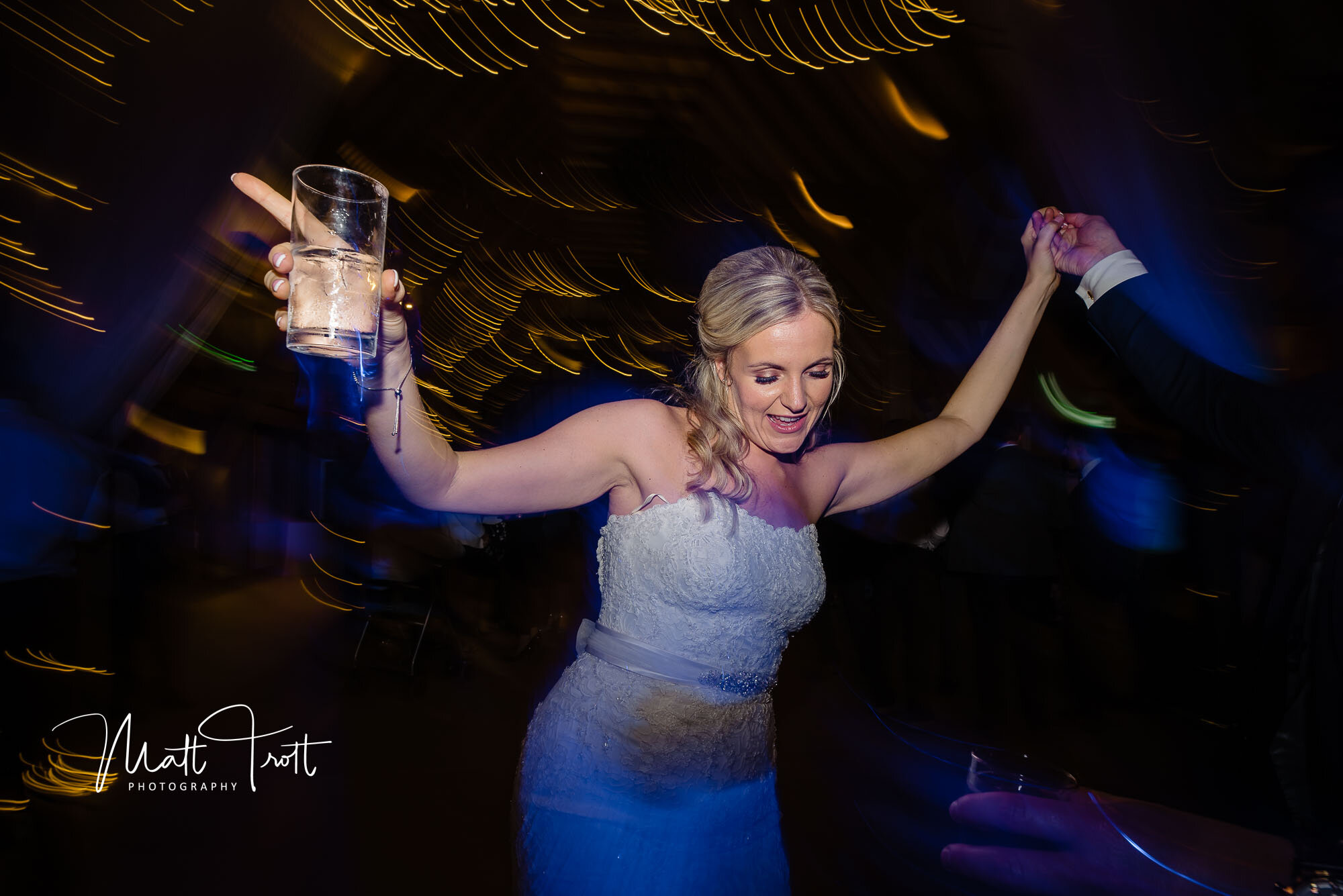 Bride dancing with best man at the old kent barn