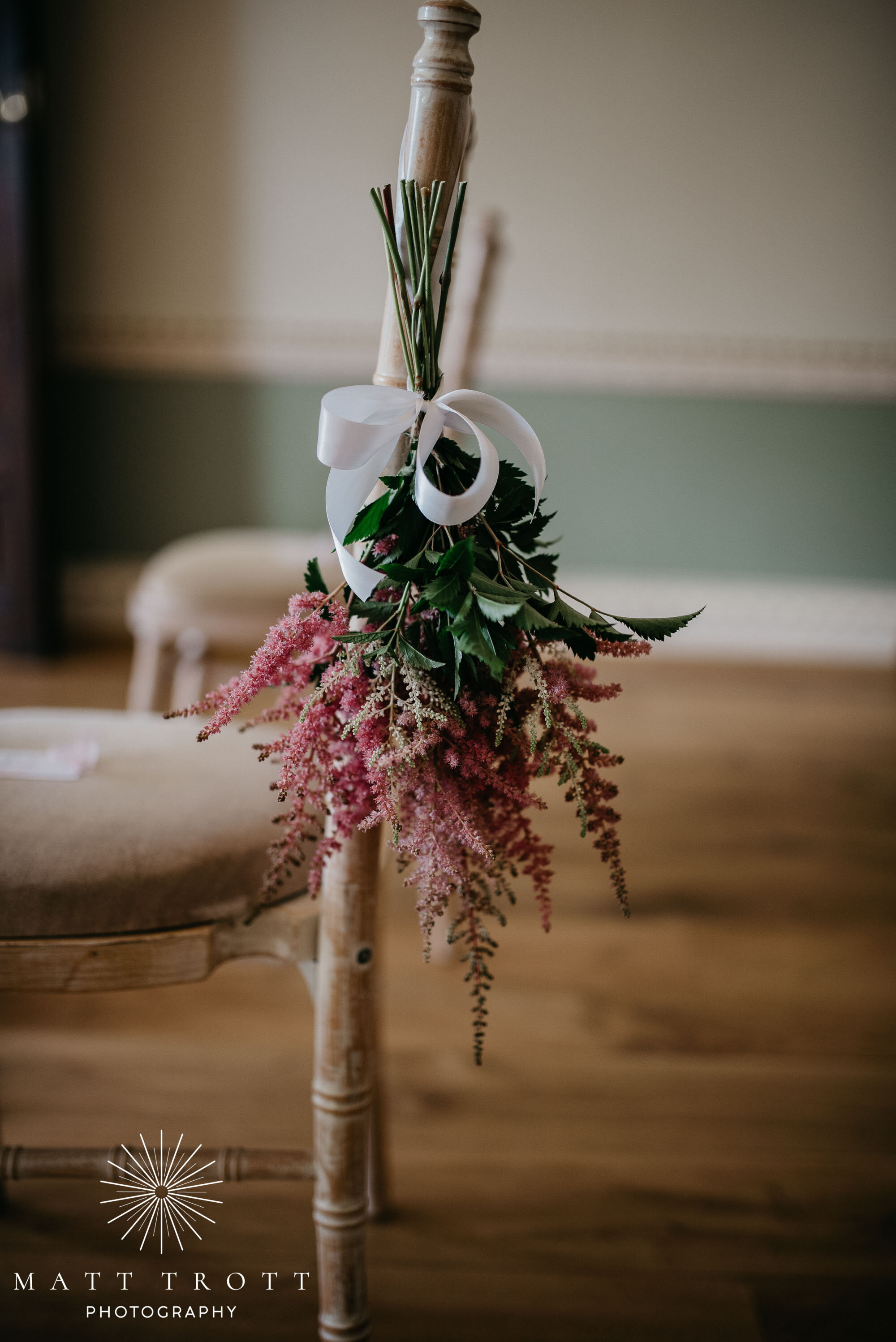 Upside down ceremony flowers during wedding ceremony at bradbourne house