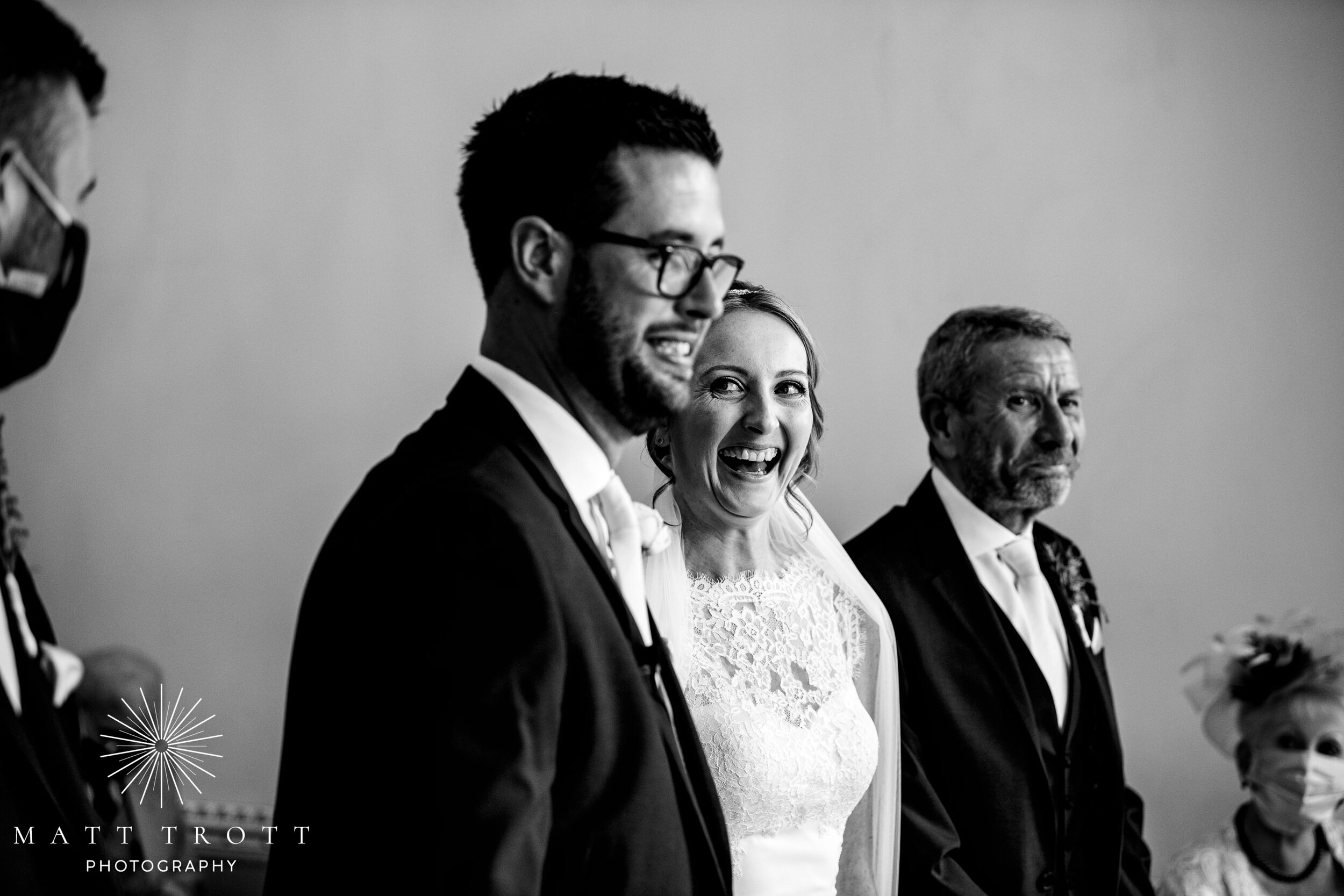 bride and groom laughing at bradbourne house