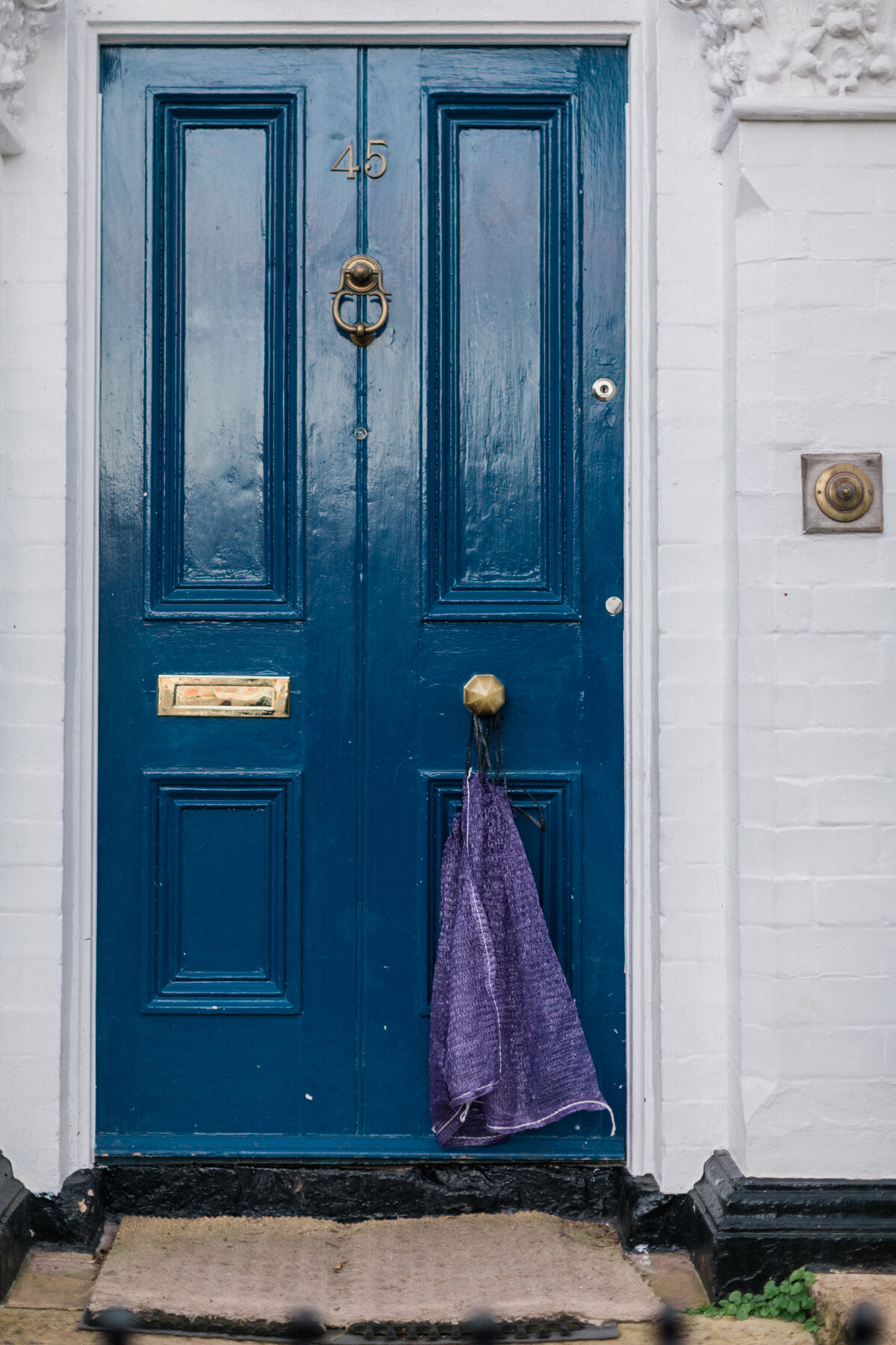 Self isolating neighbours, leave a bag out for food deliveries.