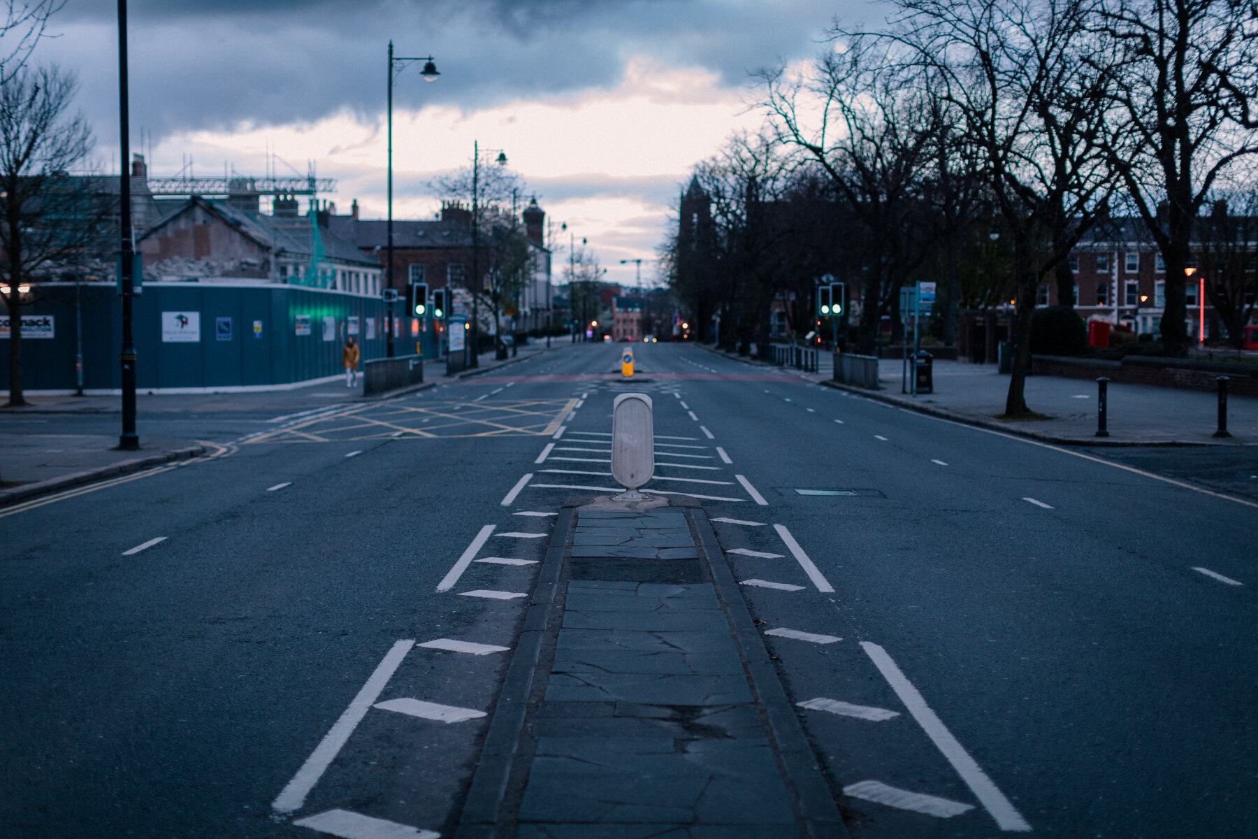 University Road, with the recently demolished students union on the left. Usually filled with evening traffic.