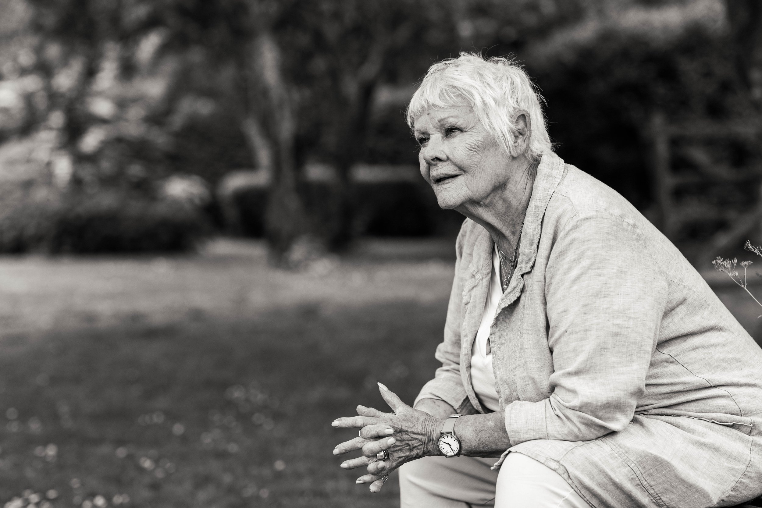 Dame Judi Dench at 90 in her garden. Black and White portrait