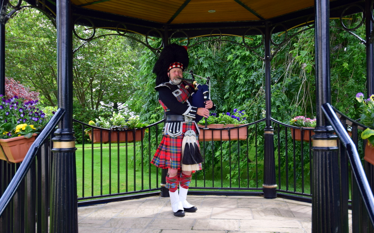 Bagpiper in Kilmarnock, Scotland