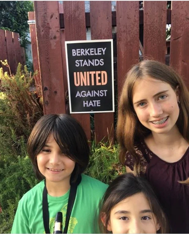 children_putting _up_signs.jpg