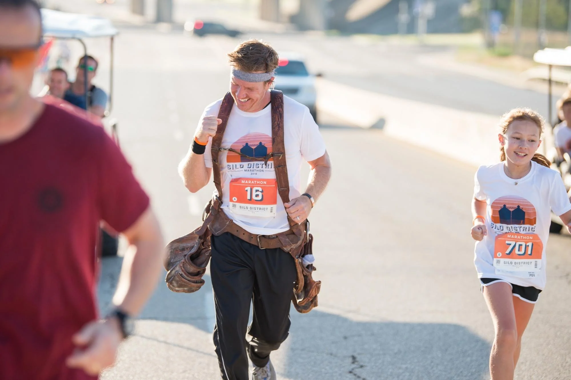 silo-district-marathon-chip-gaines-running-with-daughter-toolbelt-waco.jpg