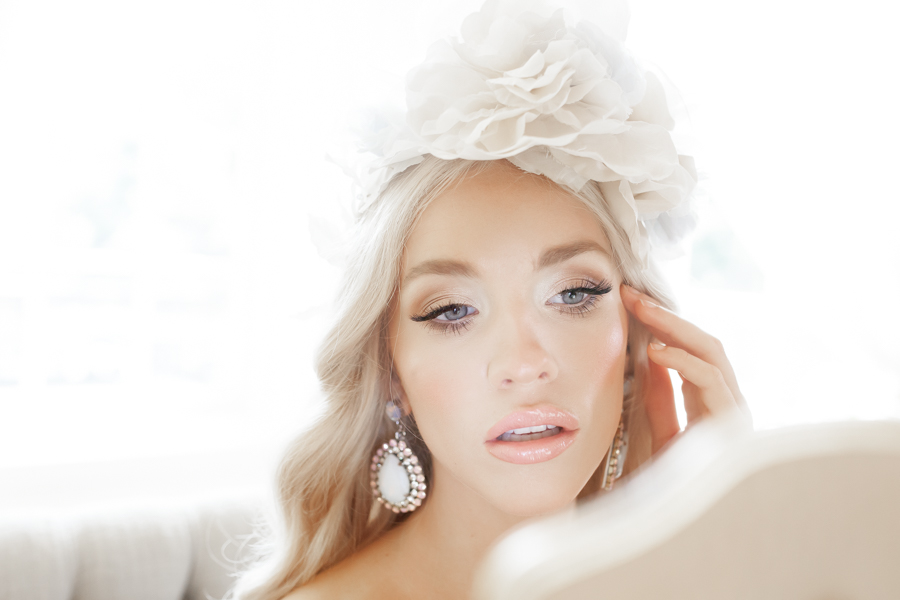 With her hair laid by Fancy Face and her makeup a true work of art, our Beauty poses for the camera with great poise.