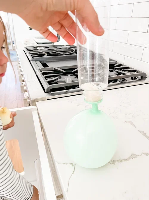 DIY sensory toy for toddlers using balloons and rice