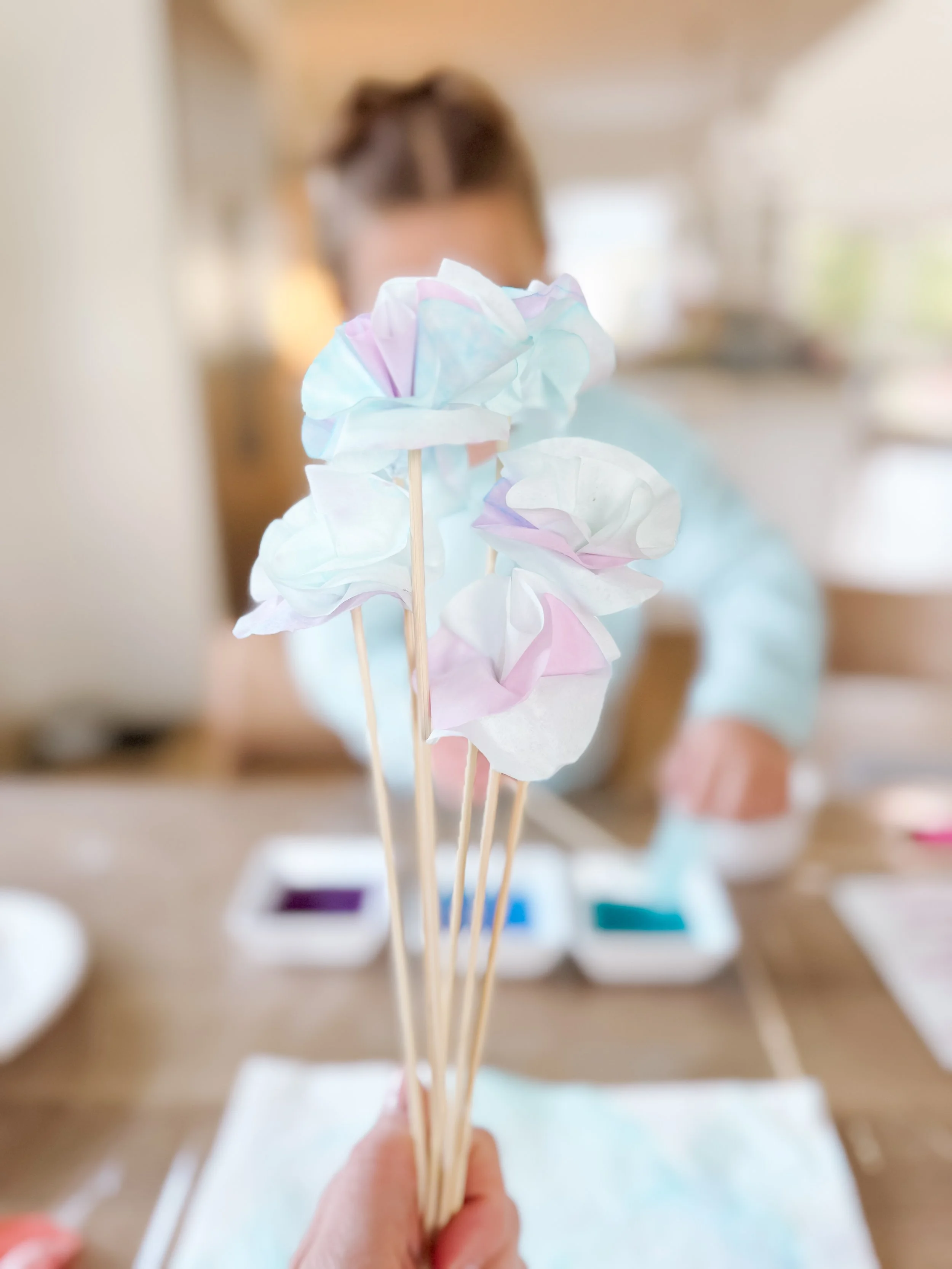  Coffee filter paper flowers craft featured in GoodnightFox Homeschool Curriculum Spring Week, combining art, science, and sensory play for toddlers 