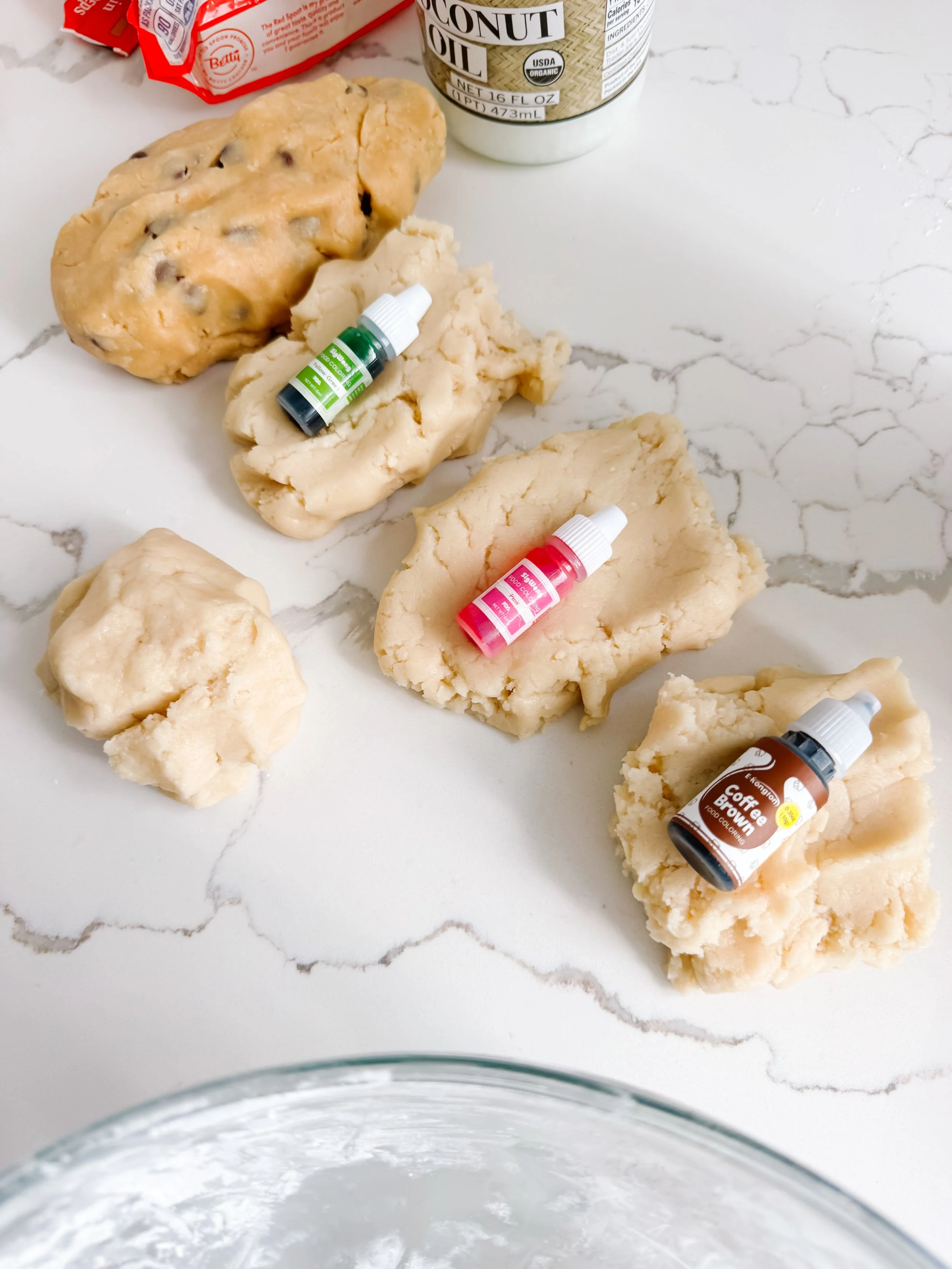 Adding melted coconut oil to cookie mix and cornstarch for ice cream dough.