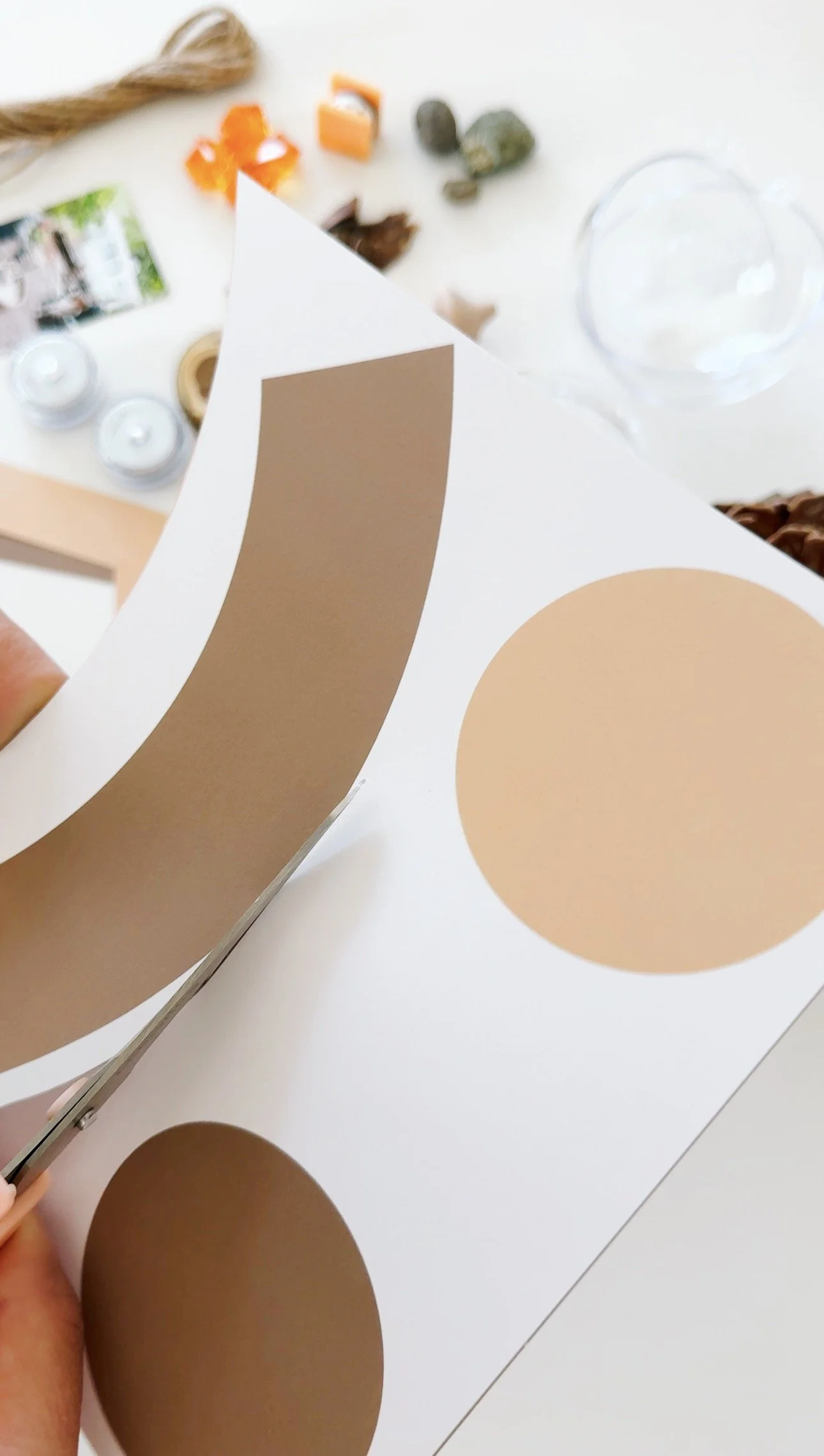 Cutting tan and brown lantern pieces from the GoodnightFox camping keepsake globe printable.