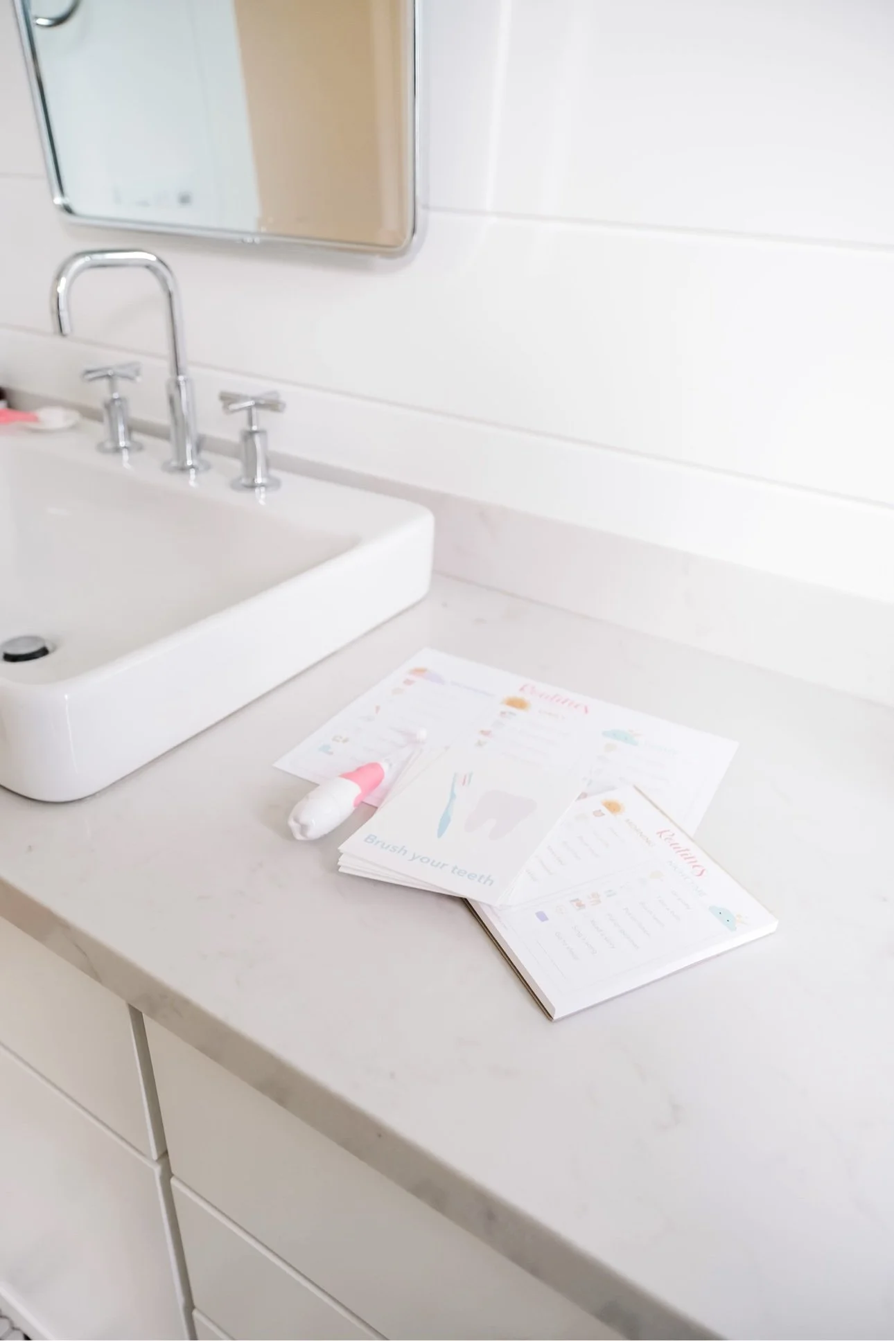 Toddler brushing teeth as one step in a visual schedule morning routine