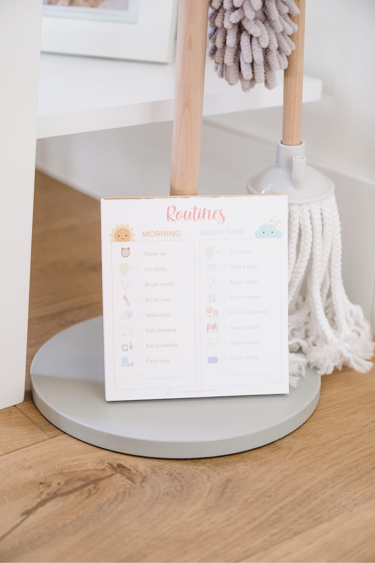 Visual schedule for toddlers displayed at toddler eye level