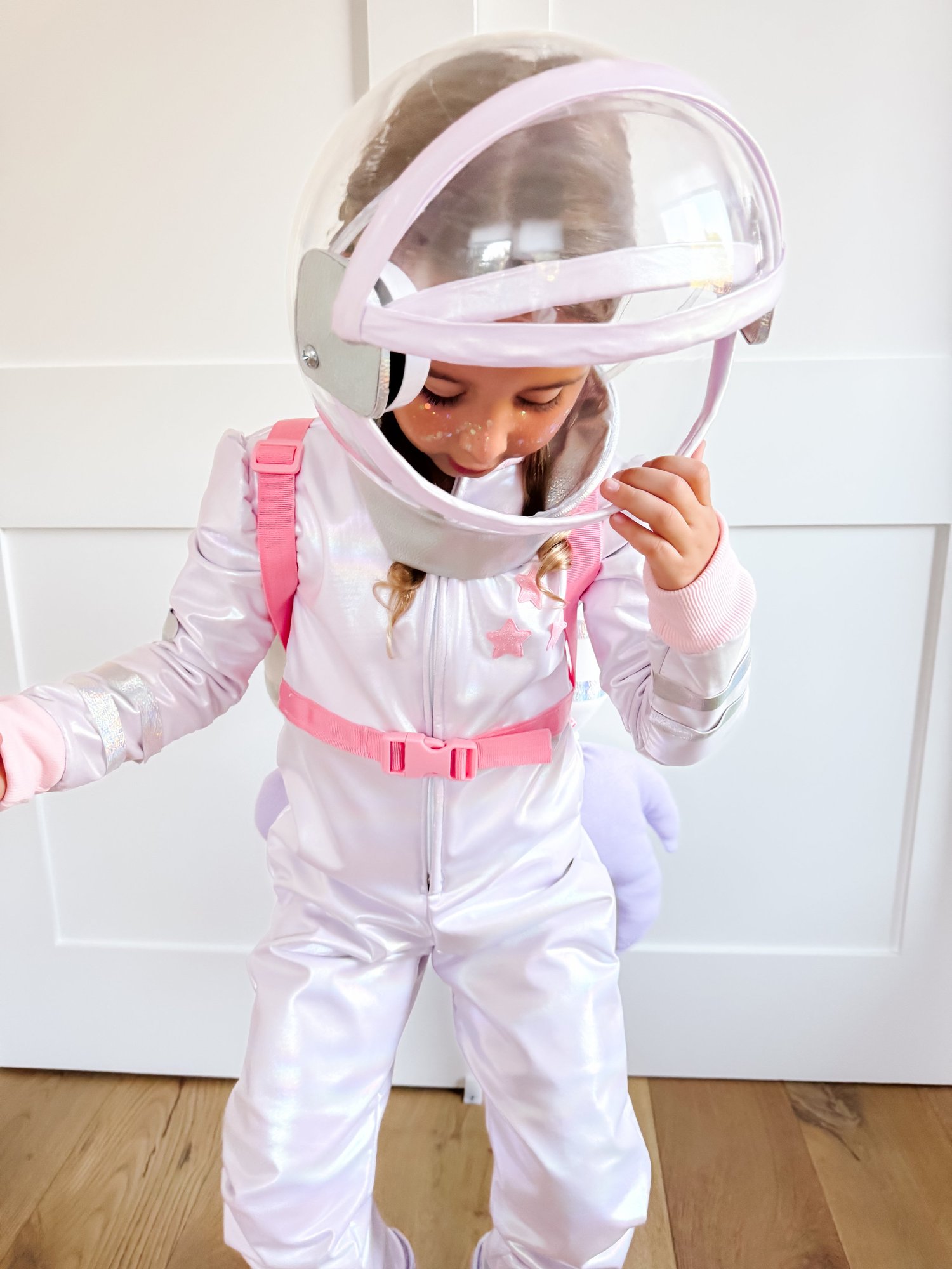Child fully dressed in the finished astronaut costume