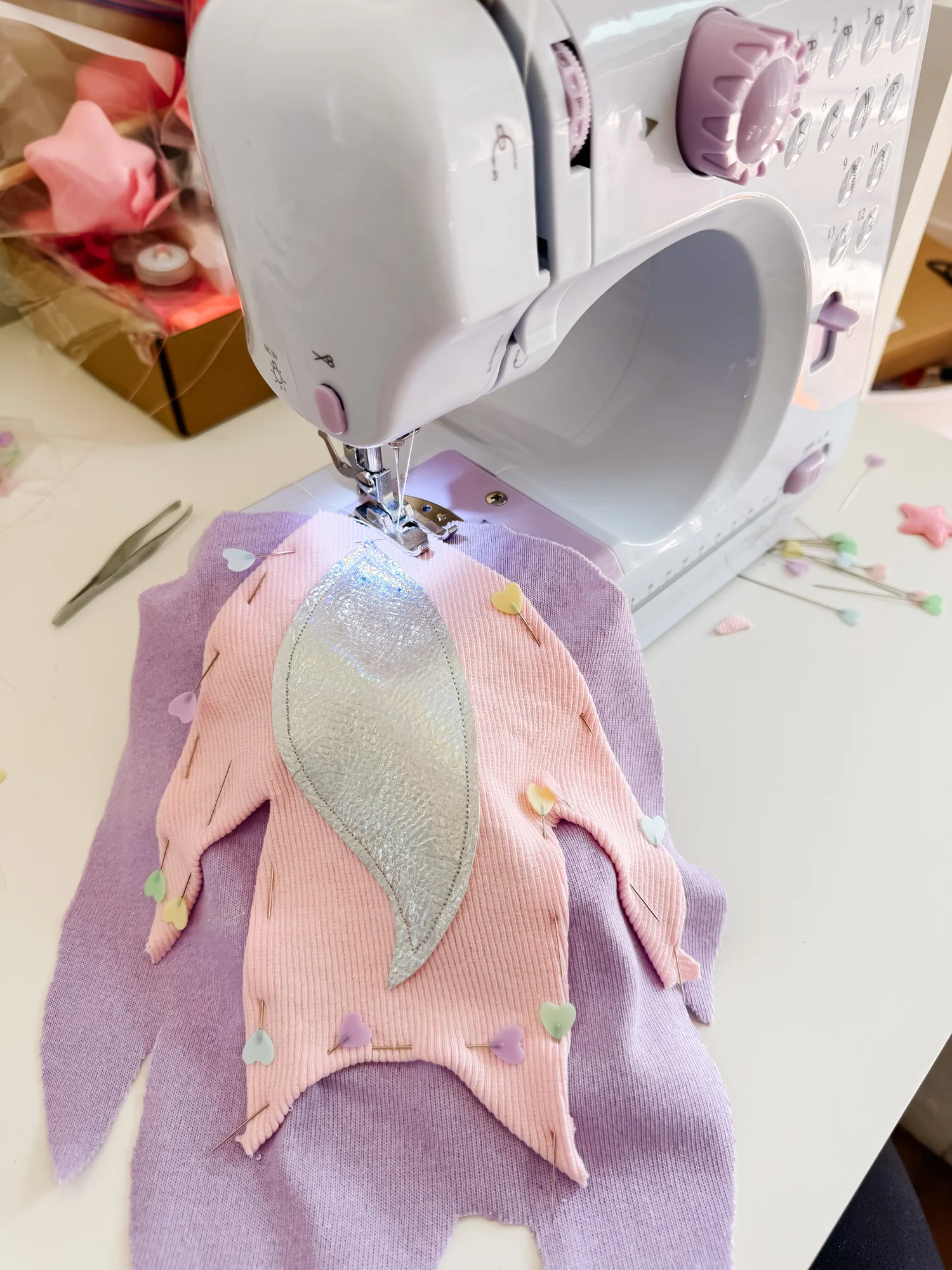 Pink belt and buckle detail on the finished spacesuit