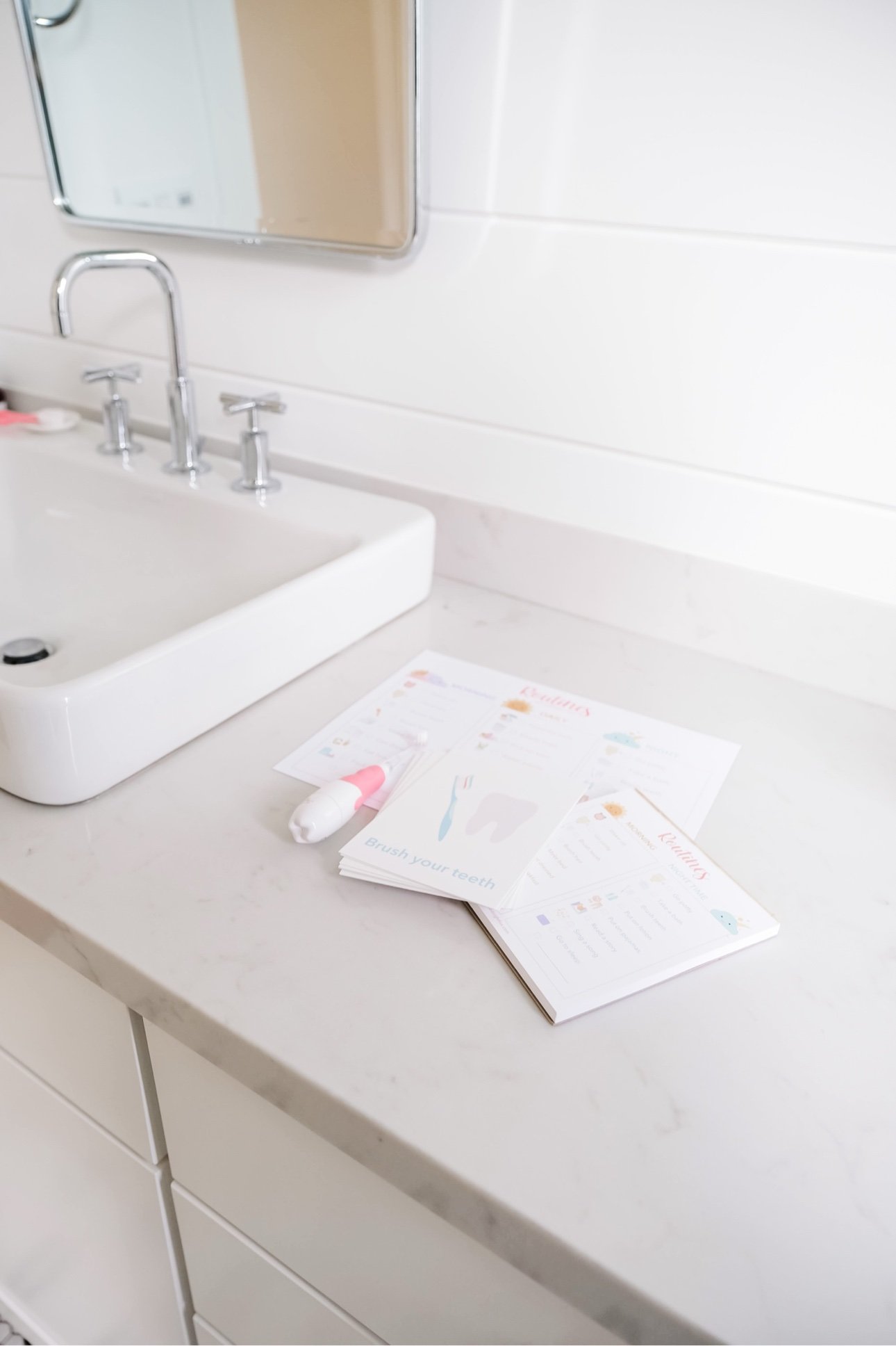 Pajamas, teddy bear, and bedtime routine checklist laid out