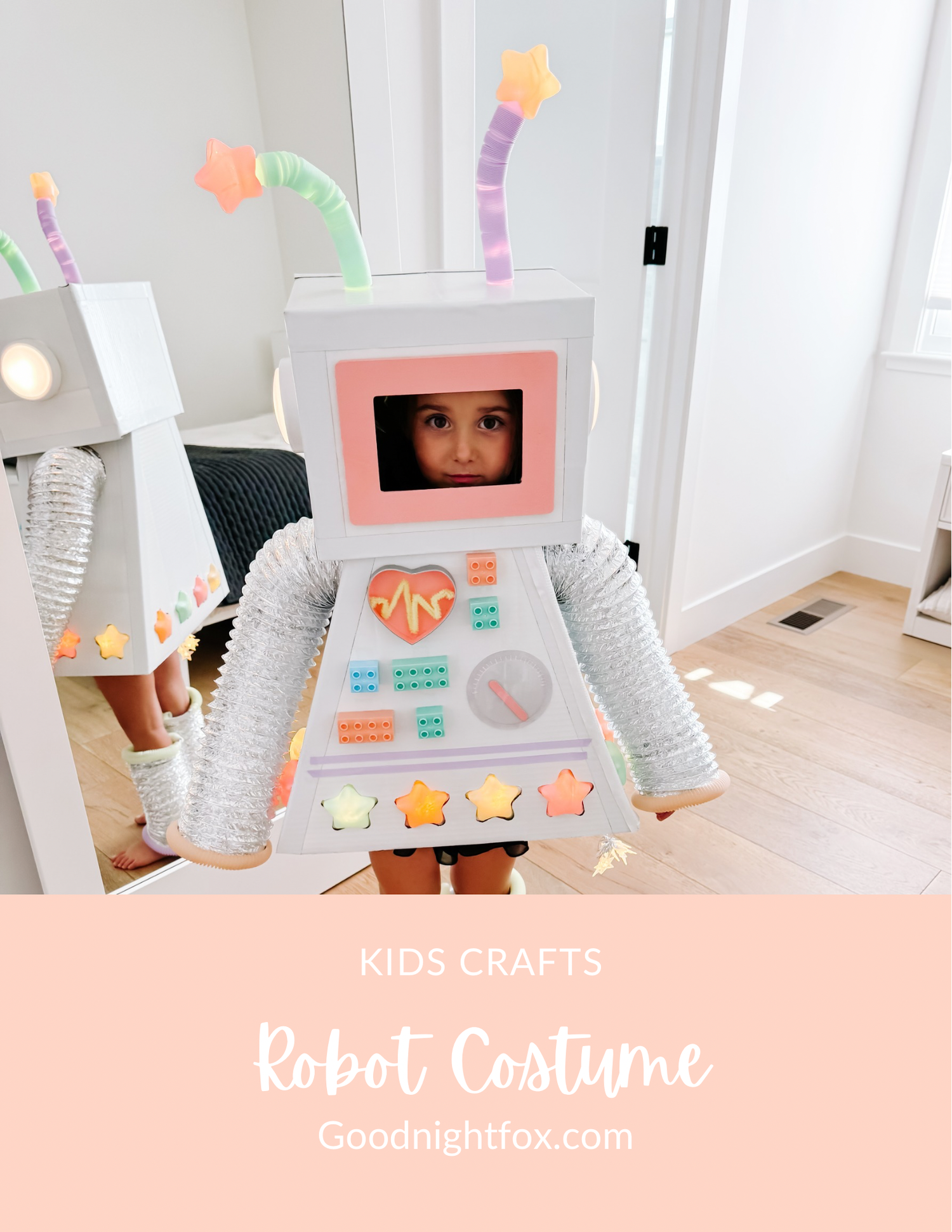 Child wearing a handmade cardboard robot costume with light-up details