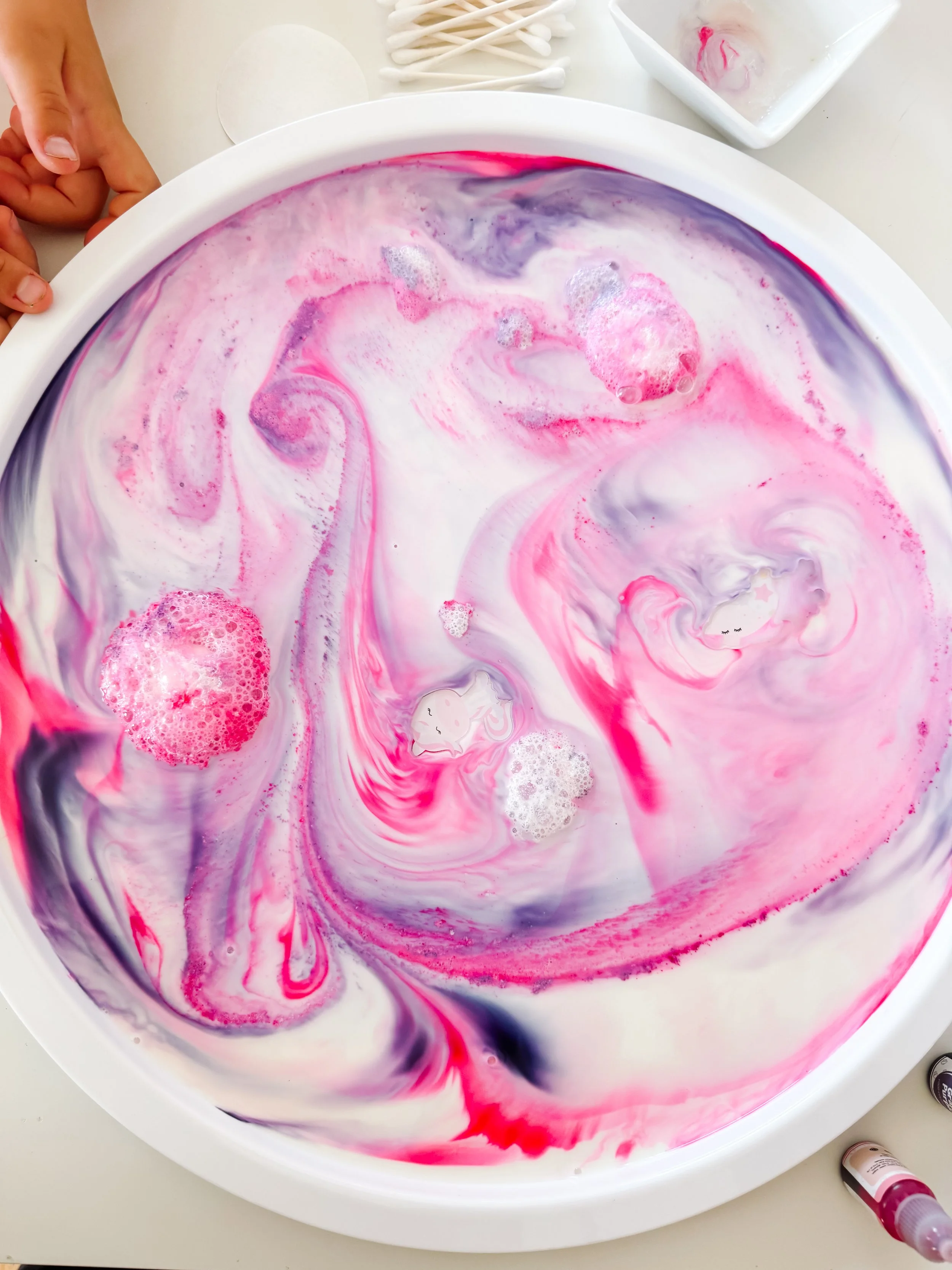 Finished Unicorn Magic Milk tray with pink and purple swirls, unicorn charms, and bubbly clouds.