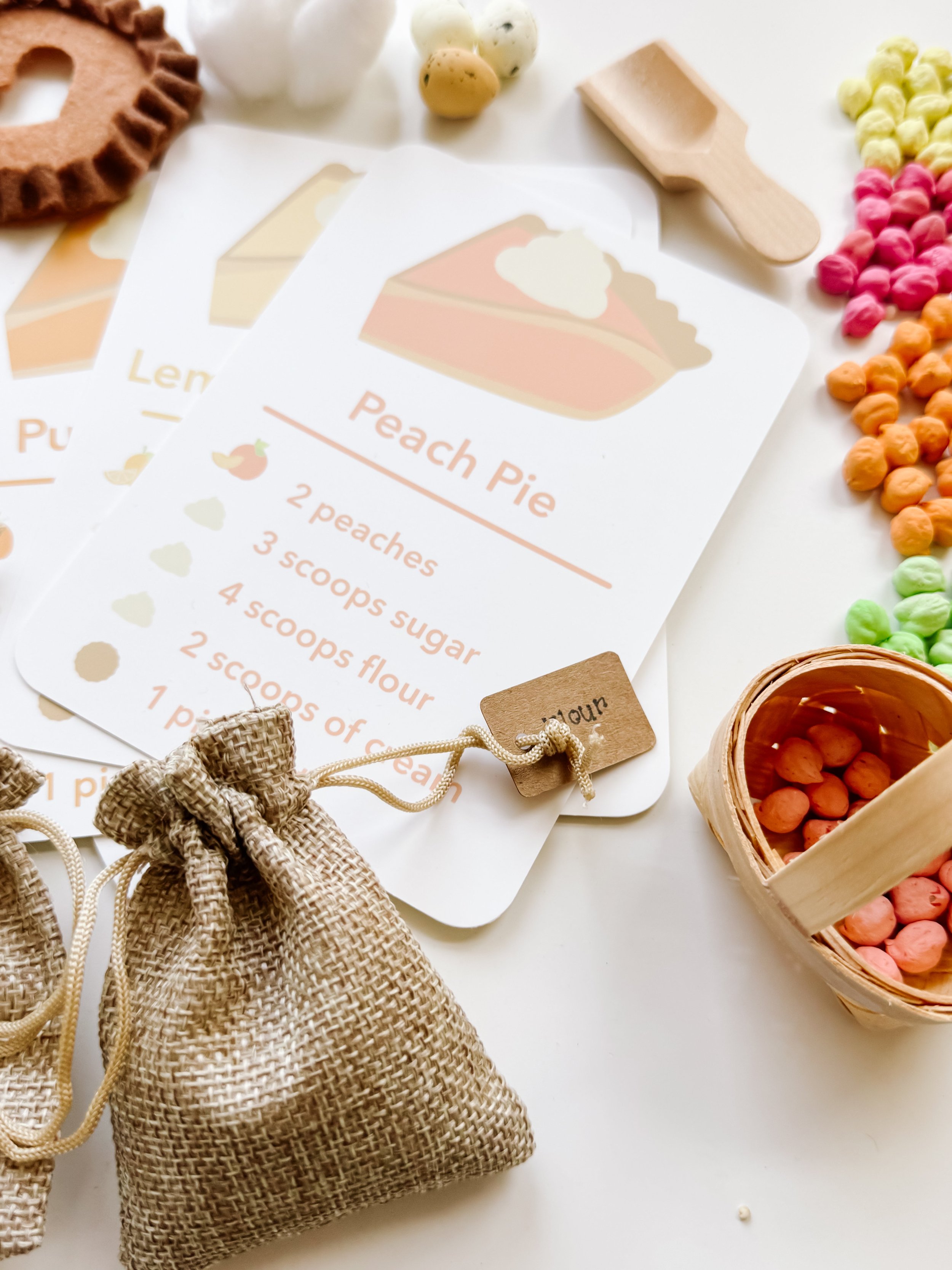 Close-up of the Peach Pie recipe card listing 2 peaches, 3 scoops of sugar, 4 scoops of flour, 2 scoops of cream, and 1 pie crust