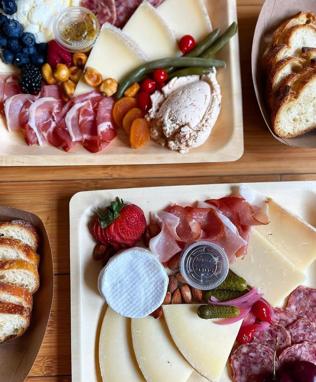 Beautiful photo from our friends @deliciohio of one of our boards available via our Online Ordering platform.  These are the perfect thing to take to a friends' house or a picnic in the park or to enjoy at home for movie night 🧀🍷