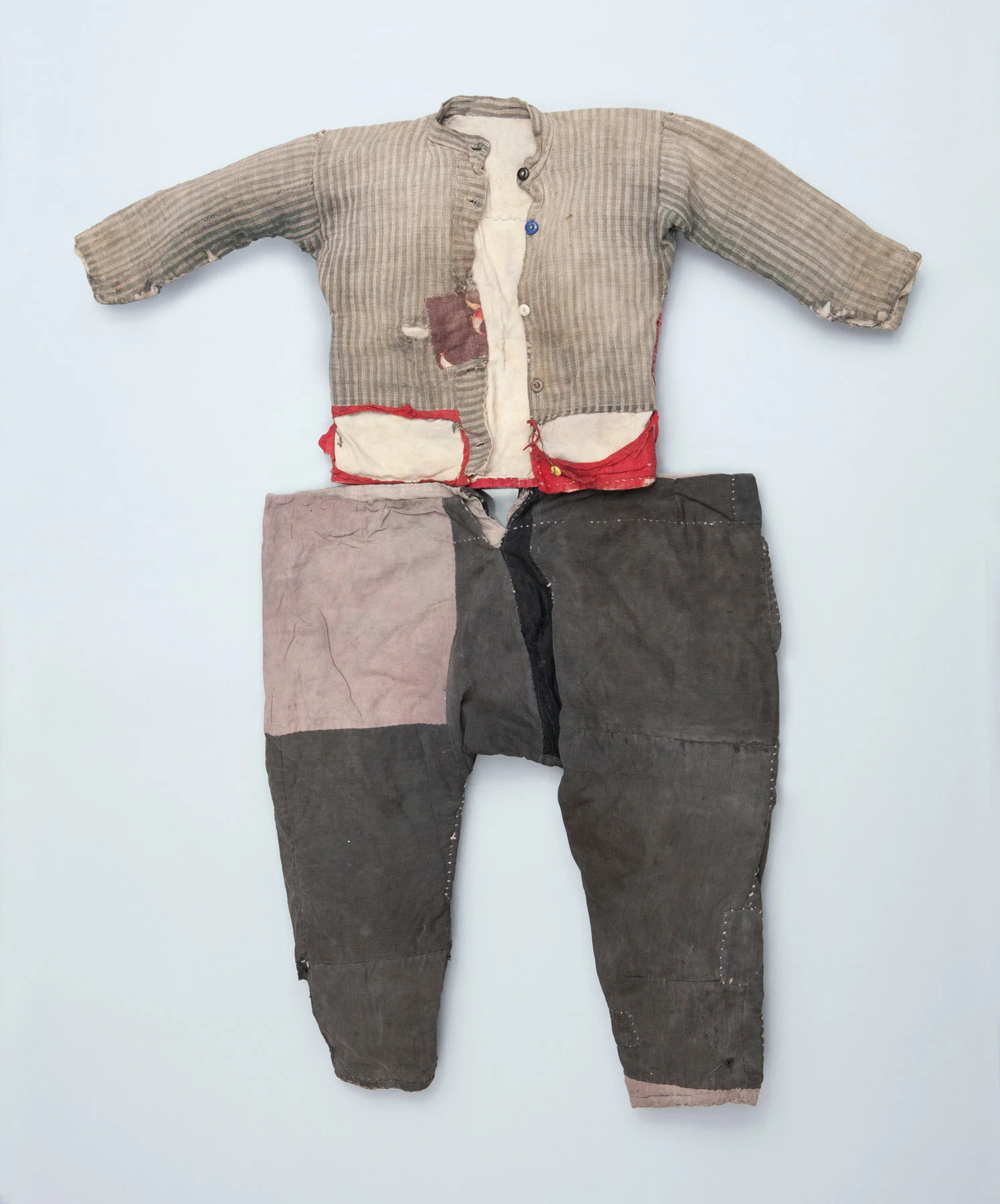 Armenian Boy’s Costume. These pants, shirt, and shoes were recovered from the body of a deceased Armenian child found in the Syrian desert by American missionary Helen Gutterson while searching for survivors. Upon presenting these to the Armenian Museum in 1973, she urged “keep these for future generations, lest people forget.”