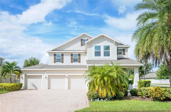 Two-story beige home in Winter Garden, FL