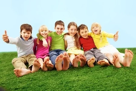 7602184_S_Children_Grass_Summer_Spring_Feet_Playing.jpg
