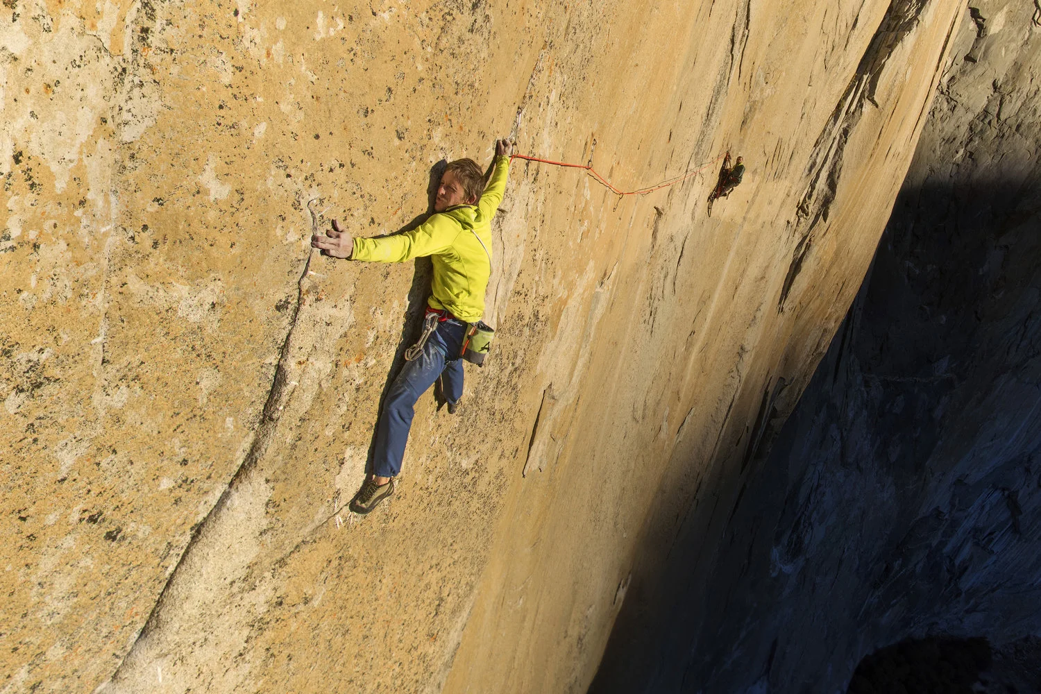 Tommy Caldwell on Pitch 15 The Dawn Wall, or the Wall of the Early Morning Light, gets this apt name because it catches the first light as the sun breaks over the Sierra Nevada mountains. On the most difficult pitch of the Dawn Wall, Tommy Caldwell must climb sideways in a long and strenuous traverse. Explore the Street View here. 