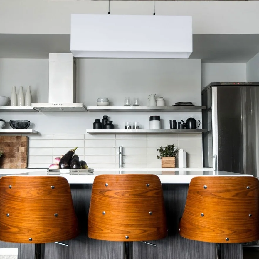 KING WEST  Masculine, eclectic and Canadiana cool. This industrial condo needed some organic forms and raw wood to balance-out the clean, modern lines. Lots of fun, custom visual touches as per the client's interests and requests.