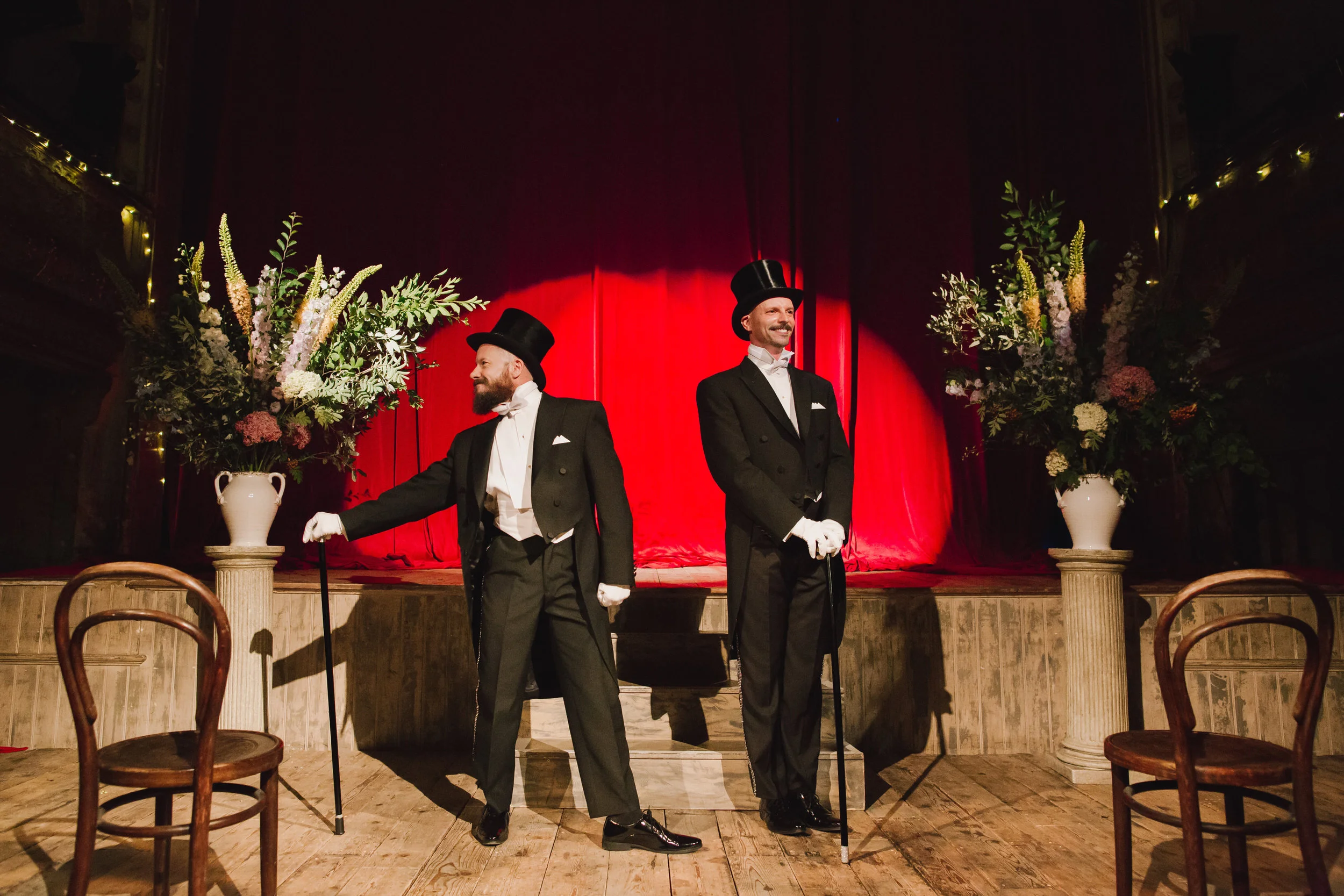 Mark and Luis striking a pose during their first dance. Photograph by Lisa Jane Photography.