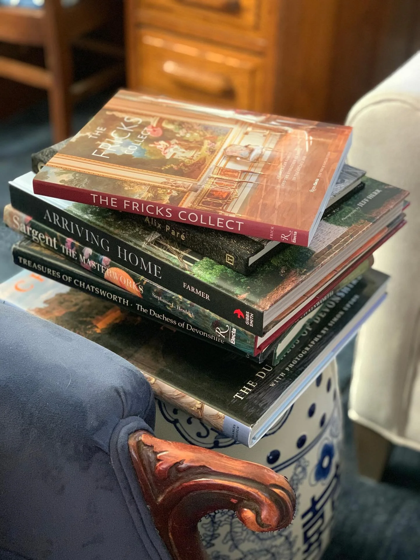 I treated myself to this garden stool during my surgery recovery last spring - knowing it would be a book repository and I love changing up the stack. I was really happy to pick up this most recent title: The Fricks Collect a few weeks ago during my 