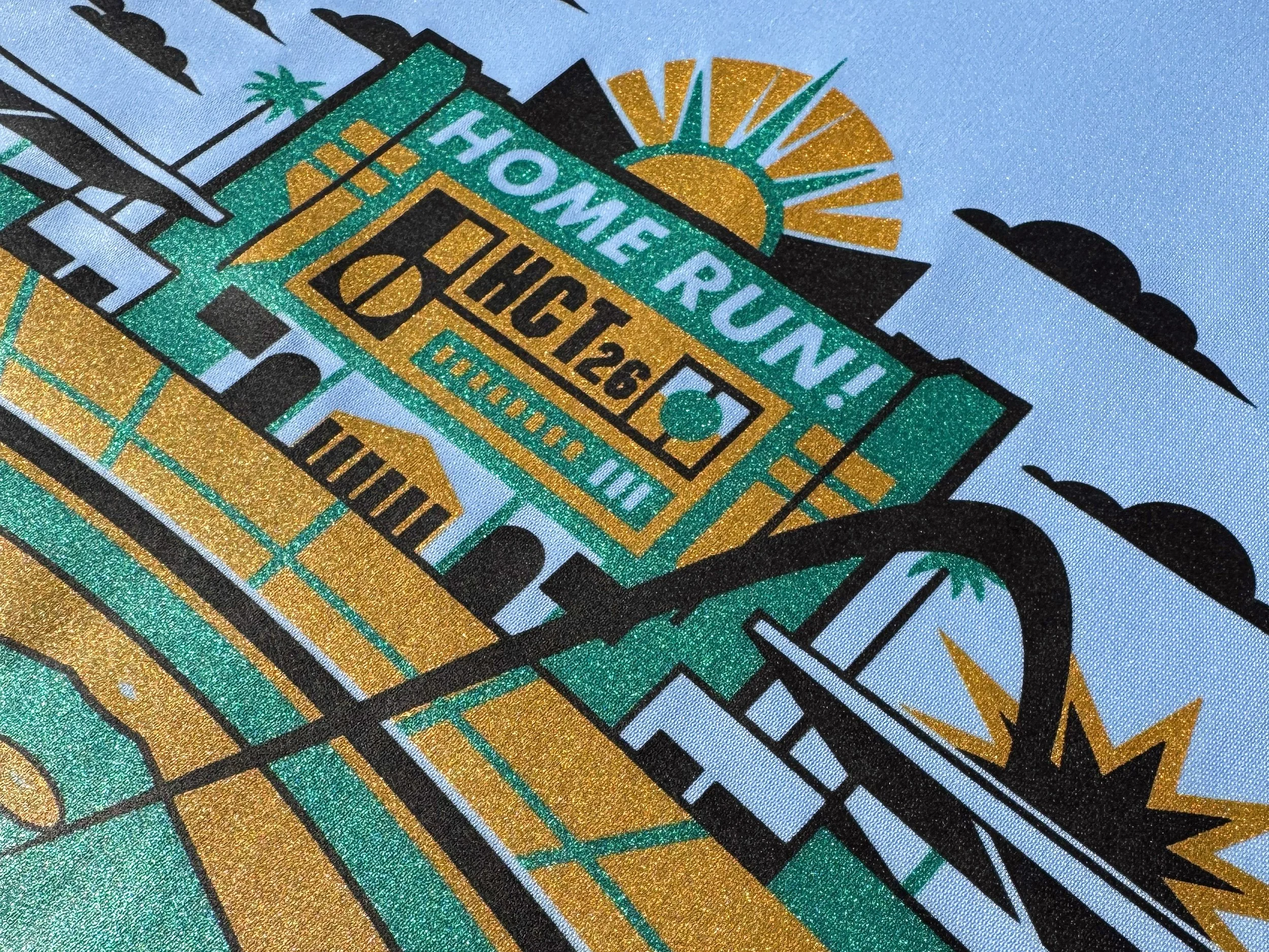 Shimmer on a performance tee, showcasing a subtle metallic print on moisture-wicking fabric with a clean, retail-ready finish.