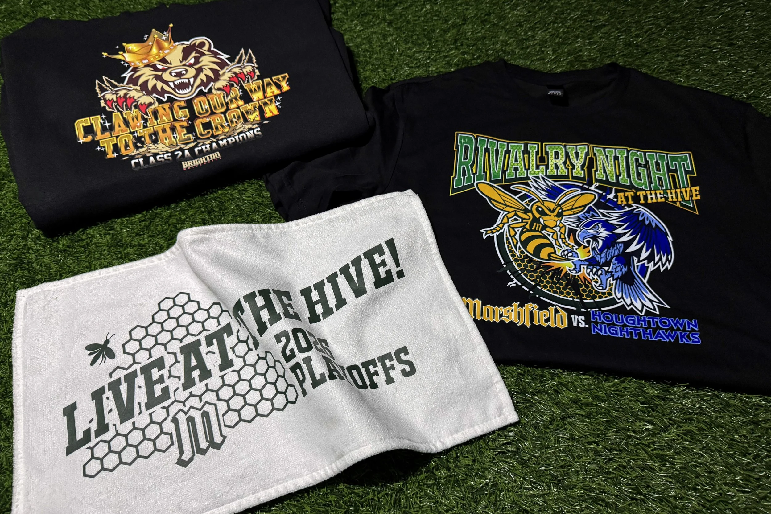 Three-piece Event Drop limited edition school collection featuring a rivalry game tee with colorVIBE DTF, a playoff rally towel with Howard Multi-Purpose, and a championship hoodie with colorVIBE Hybrid metallic illusion finish