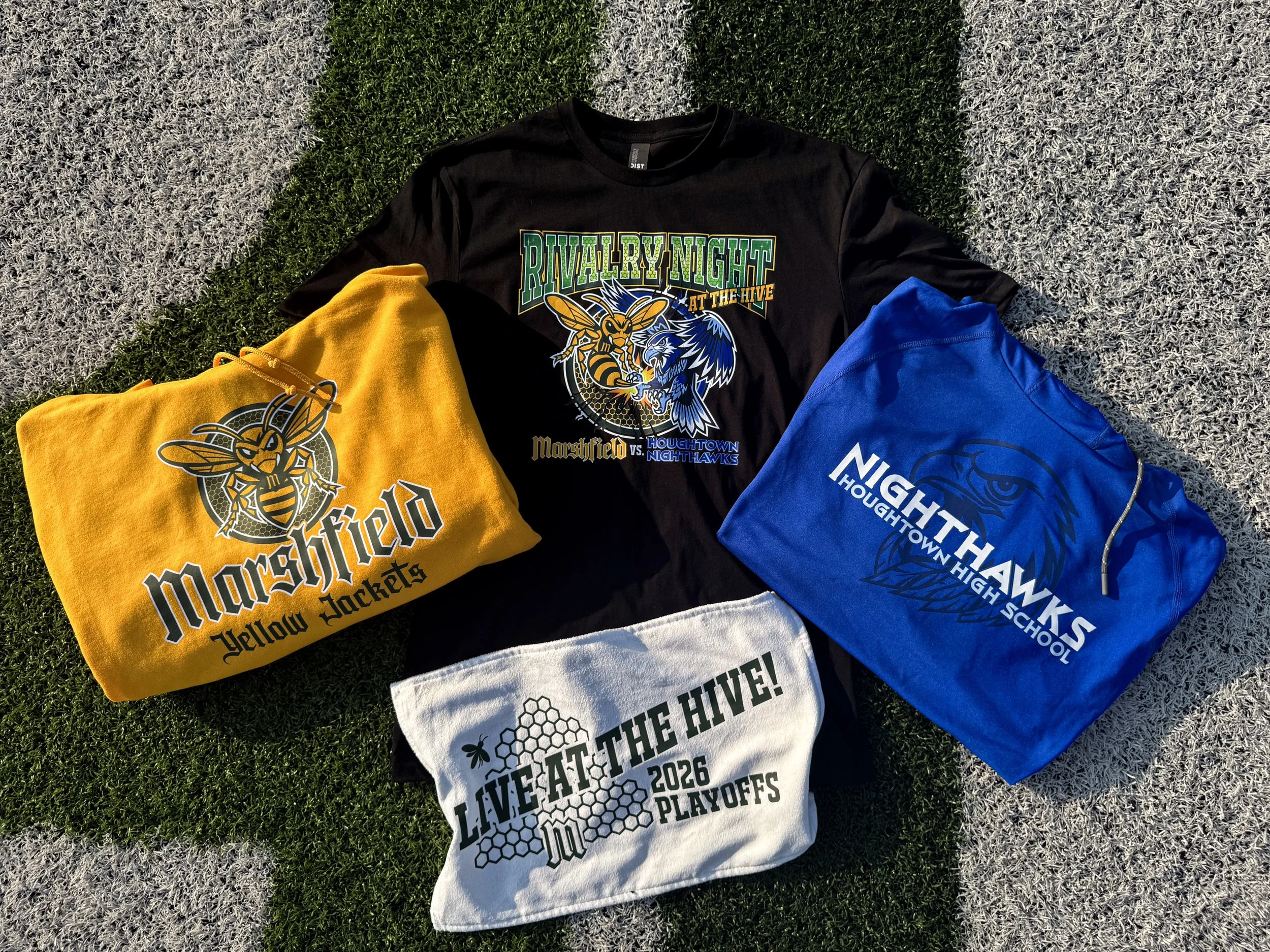 Limited edition rivalry event drop displaying coordinated spirit wear merch for both competing school teams, showing how a single drop can serve both sides of a matchup with custom heat transfer decoration