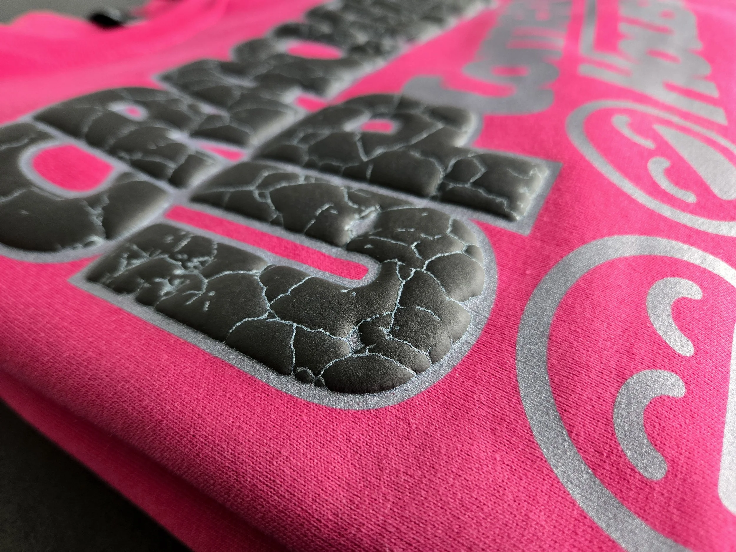 Puff screen printed heat transfer on the Port & Company PC78 Core Fleece Crewneck Sweatshirt in Sangria, creating a raised, dimensional effect on a soft fleece crewneck.