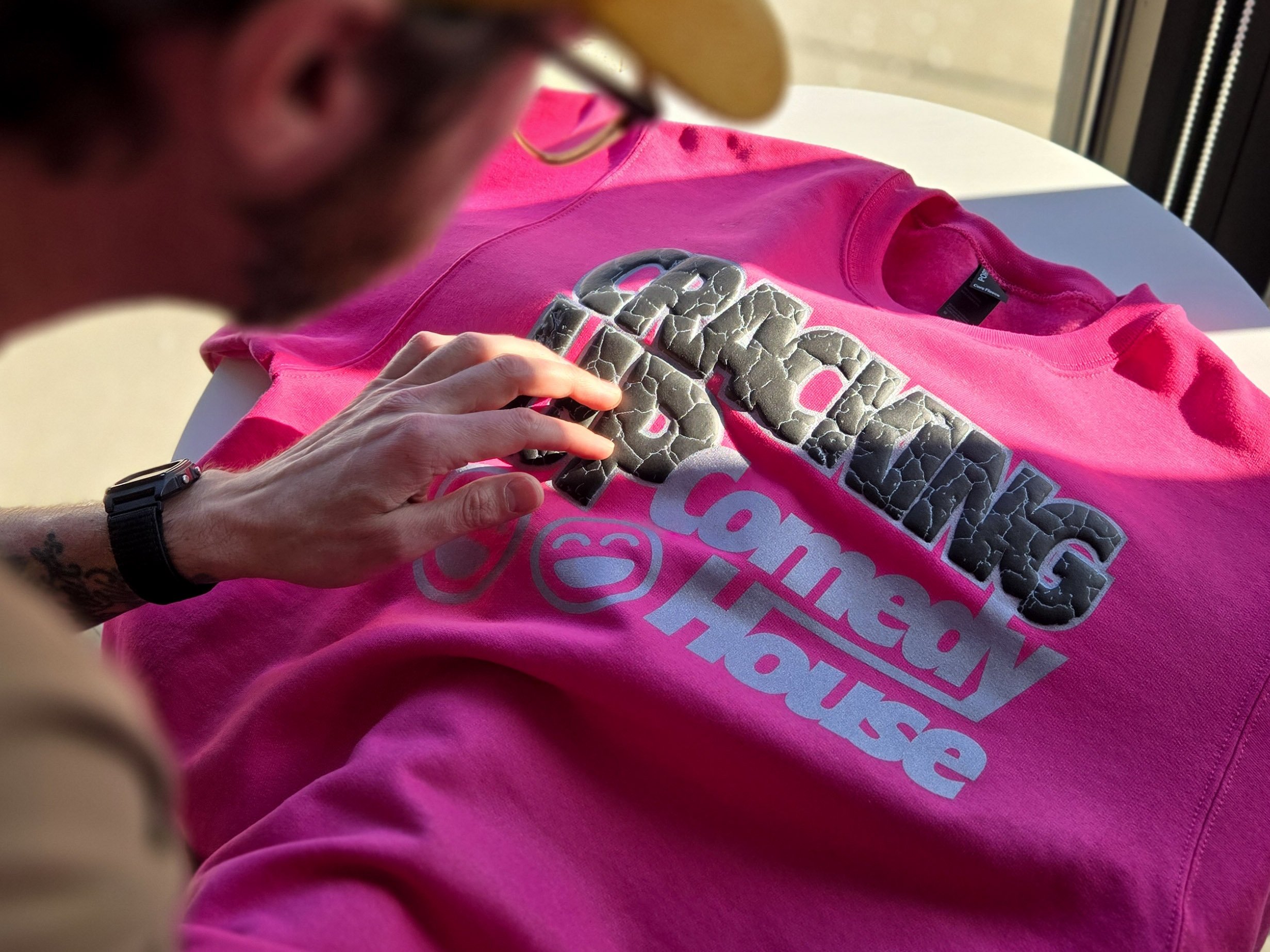 Raised puff print on a crewneck sweatshirt, using the Port & Company PC78 Core Fleece Crewneck Sweatshirt in Sangria to demonstrate a bold, textured heat transfer finish.