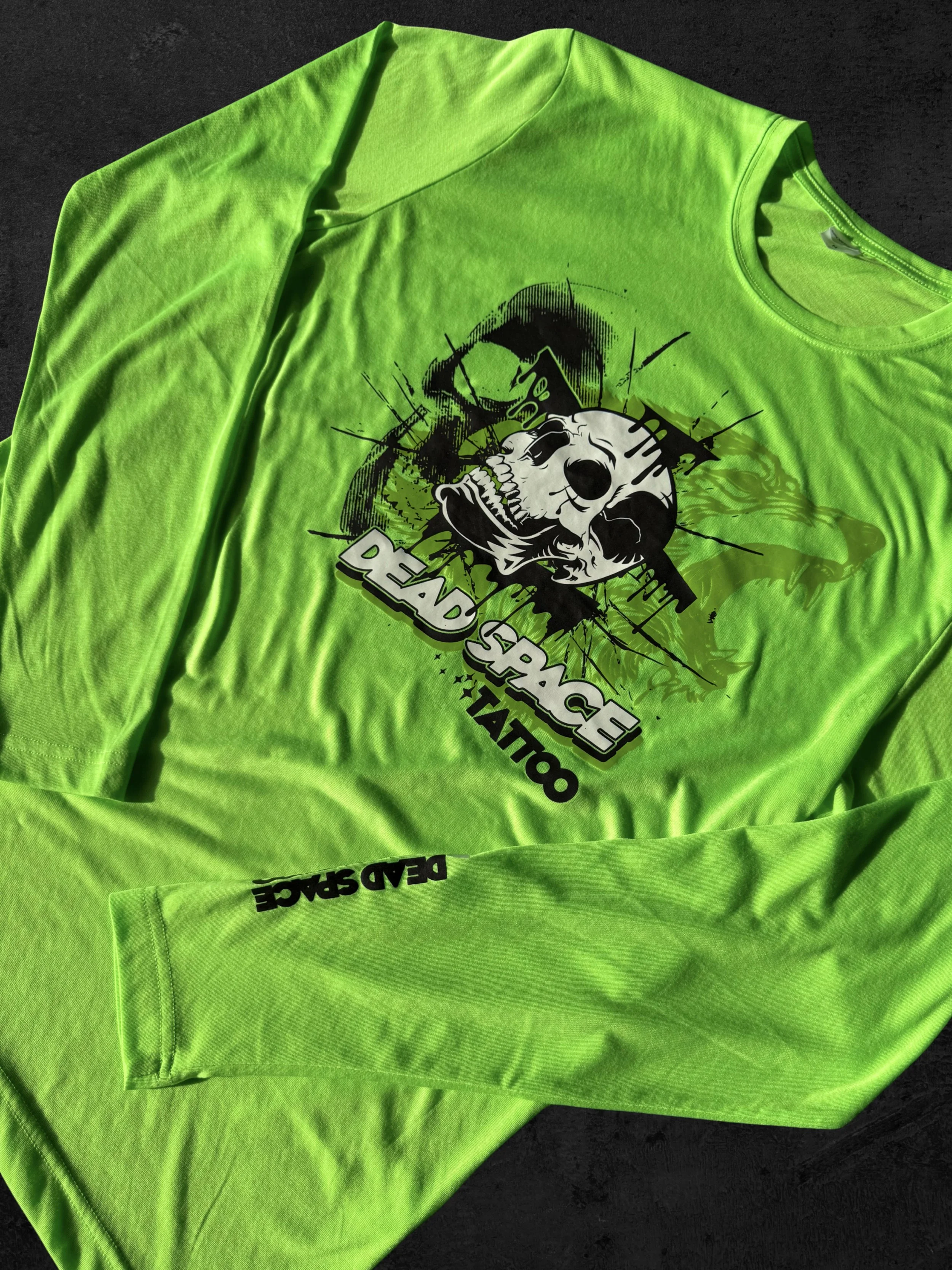 Four-color Howard Multi-Purpose transfer with Specialty Finish Glow in the Dark adding contrast and visibility on premium long sleeve shirt