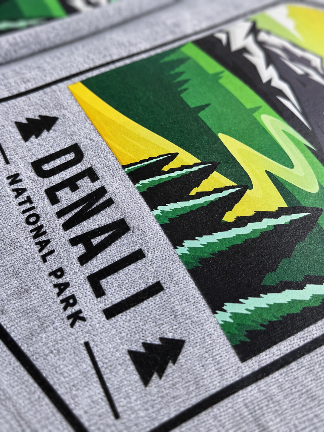 Close-up of Denali destination artwork and fleece texture