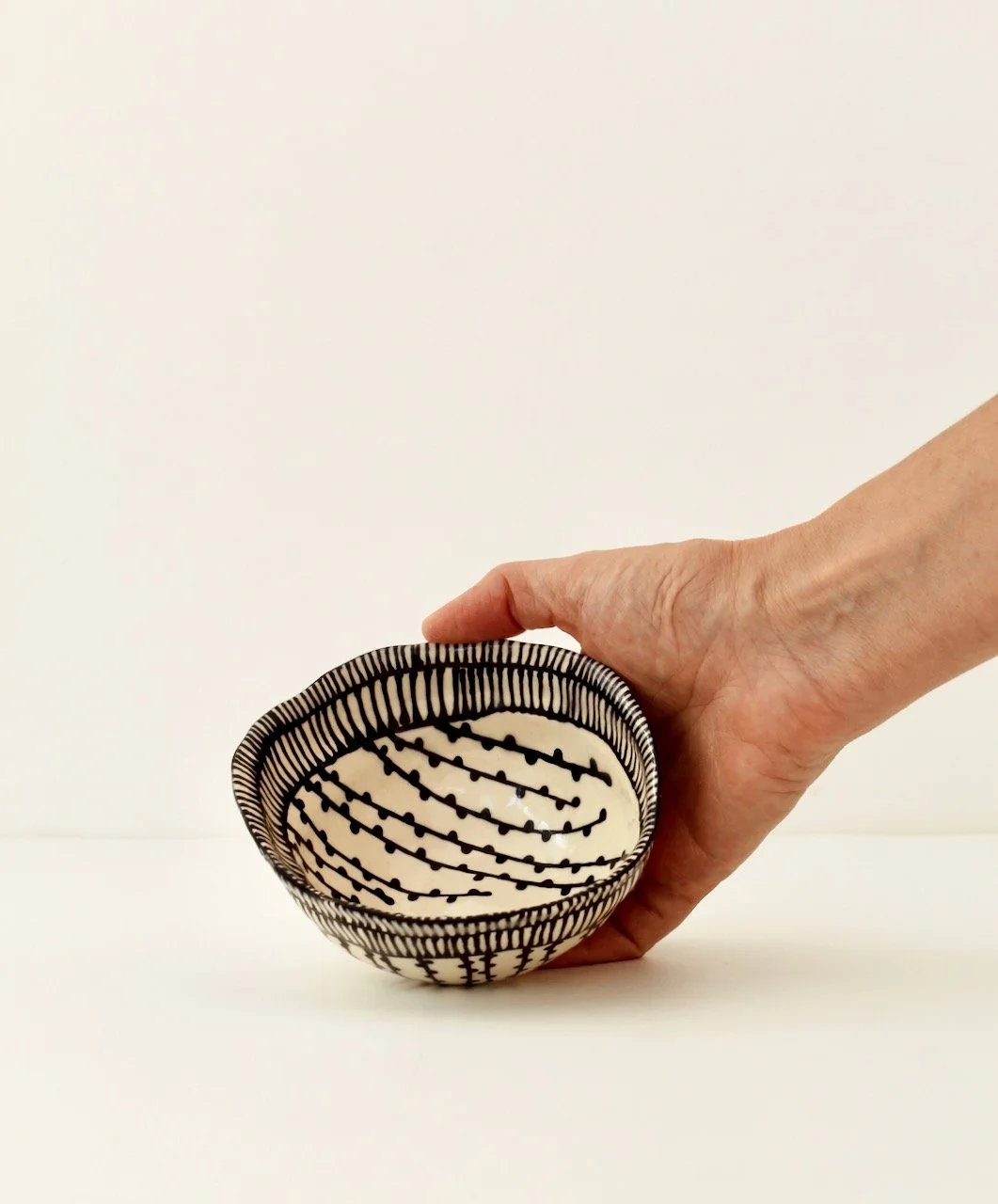 Barro by Lucrecia Willow Bowl hand.jpeg