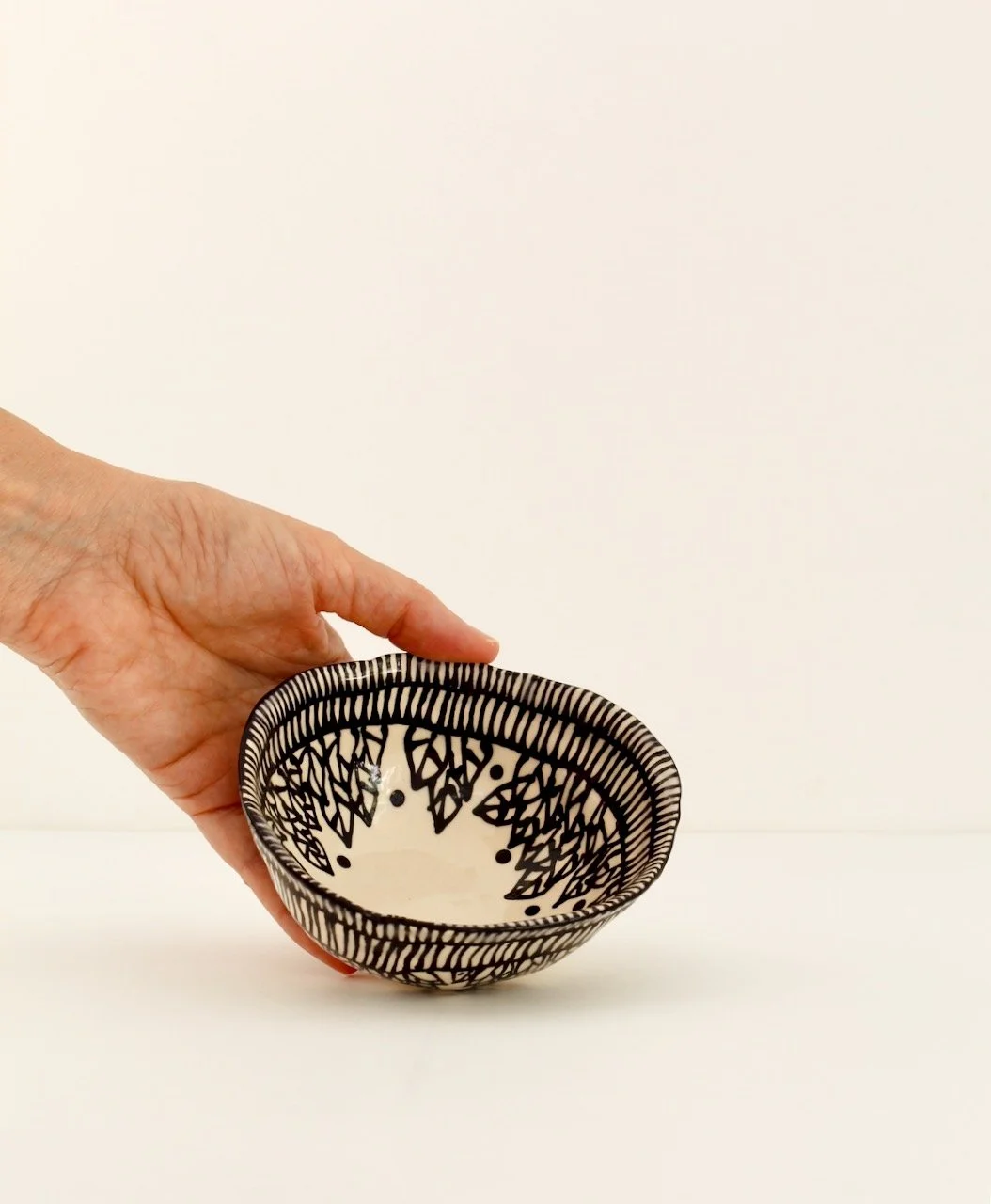 Barro by Lucrecia Leaves Bowl hand.jpeg