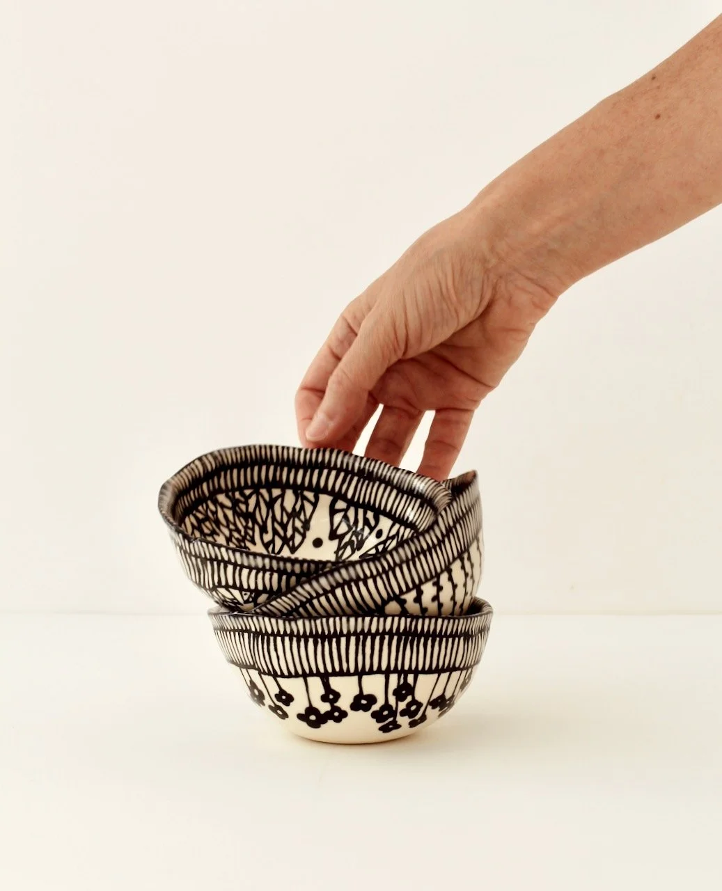 Barro by Lucrecia Stacked Bowls Hand.jpeg