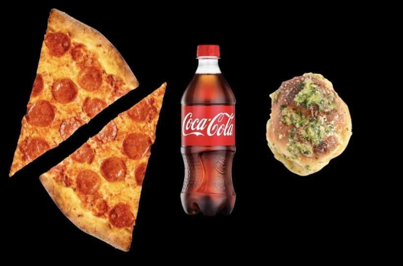 Slice of pepperoni pizza, Coca-Cola bottle, and a piece of cake on a black background.