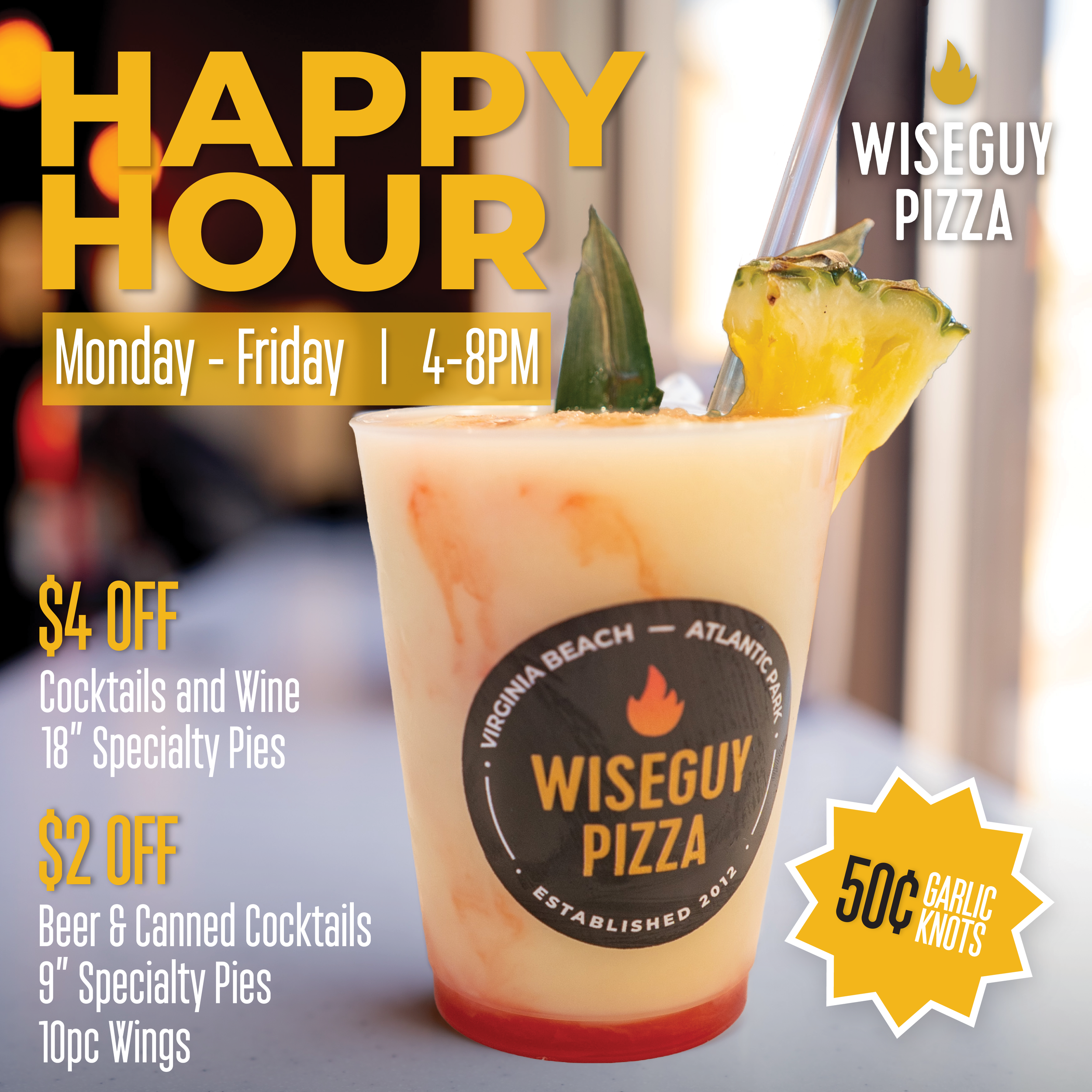 Frozen cocktail with pineapple garnish on a table, shown with text promoting Wiseguy Pizza Happy Hour deals on drinks, specialty pies, wings, and 50-cent garlic knots.